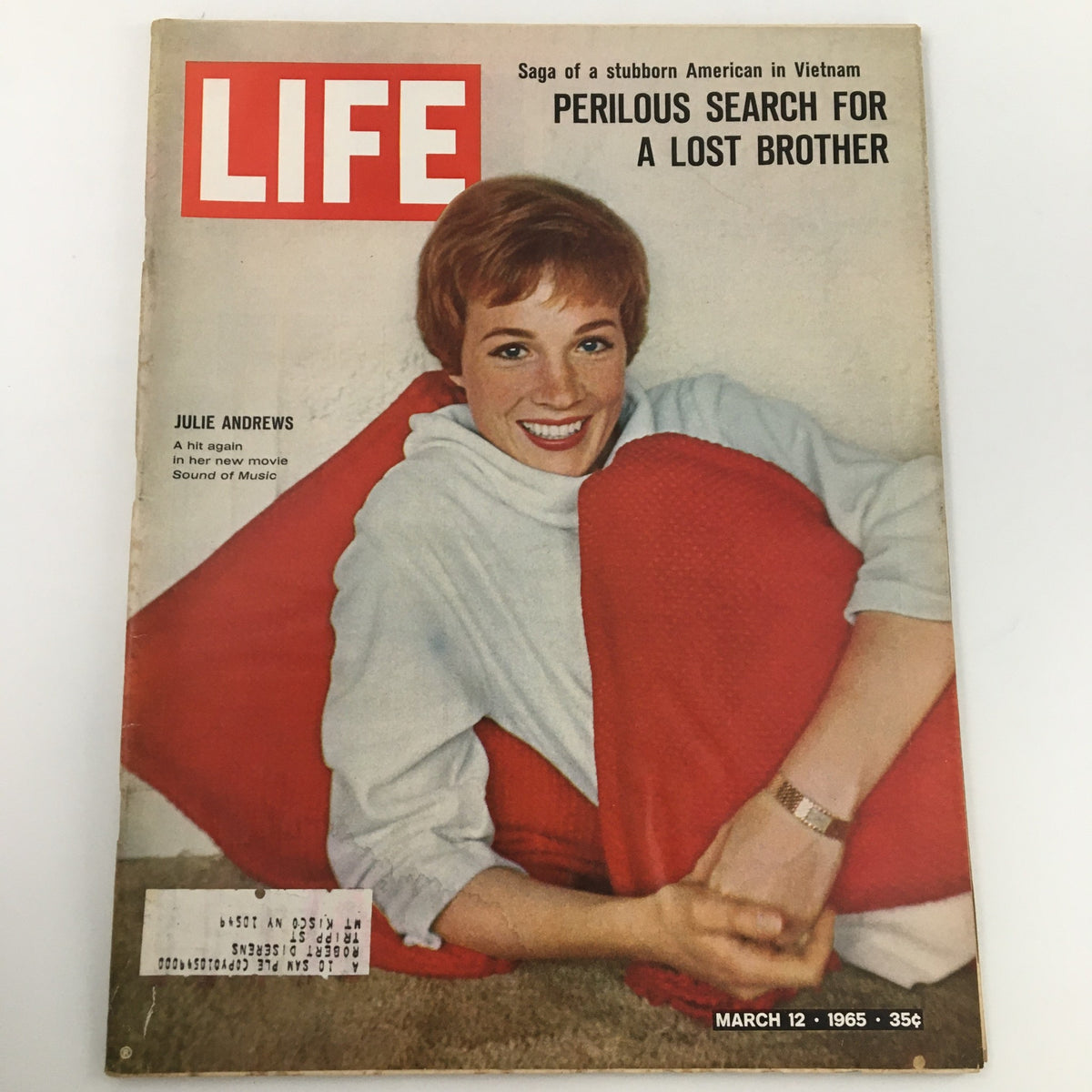 Vintage Life Magazine cover from March 12, 1965 featuring actress Julie Andrews, showcasing her role in The Sound of Music with a charming pose and vibrant colors.