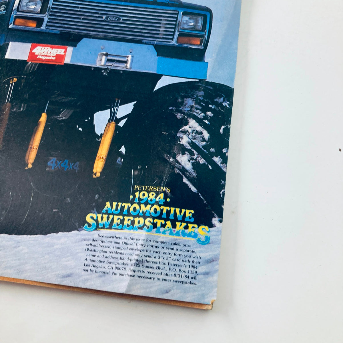 Front cover of VTG Petersen's 4 Wheel & Off-Road Magazine May 1984 showcasing the Bigfoot III along with the notice for the 1984 Automotive Sweepstakes.