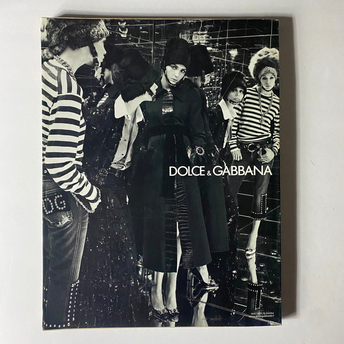Striking black and white fashion editorial from Dolce & Gabbana, featured in the August 2005 issue of W Magazine with actress Katie Holmes on the cover.