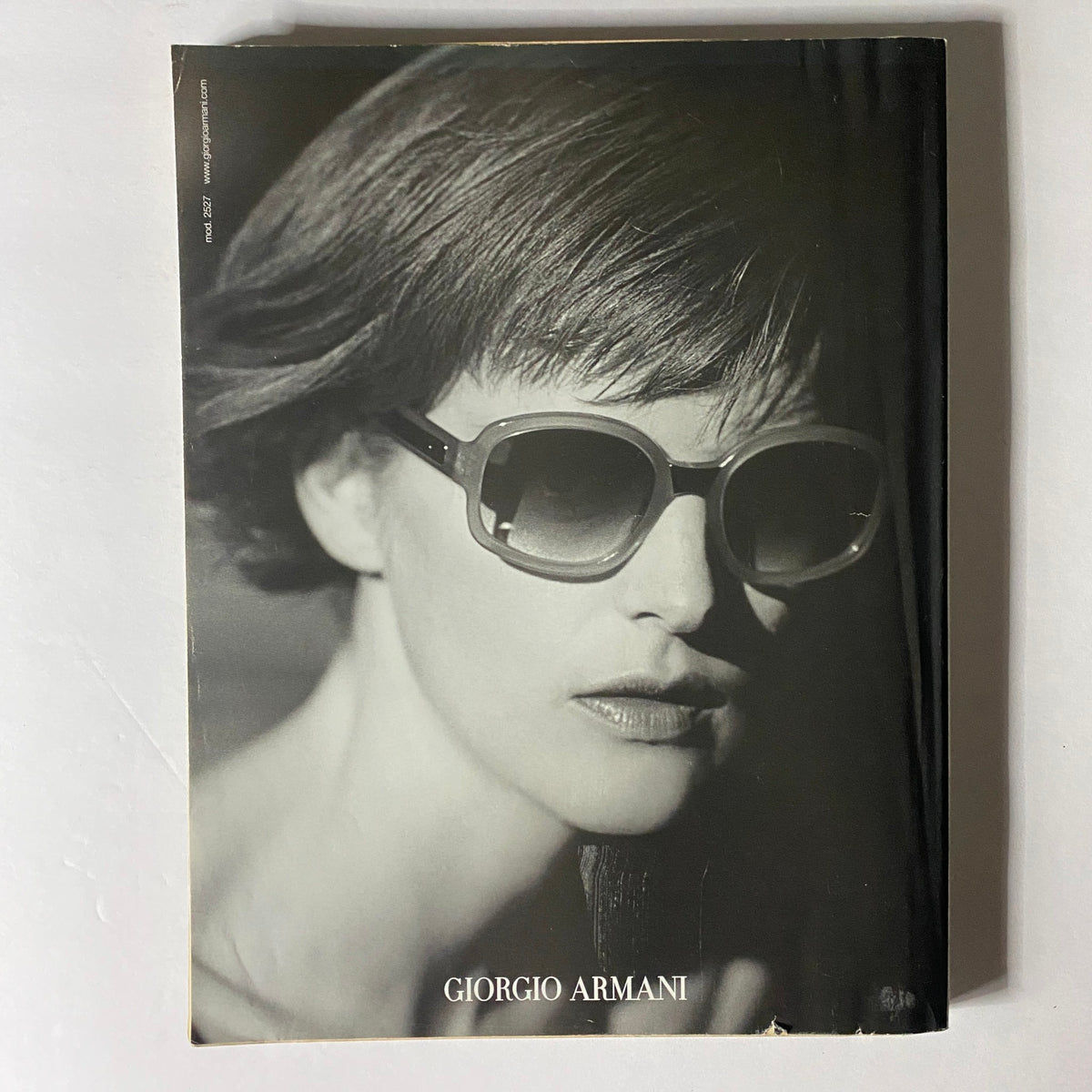 W Magazine April 2001 Punk Princess Kate Moss Cover displaying a striking black and white Giorgio Armani advertisement featuring stylish sunglasses.