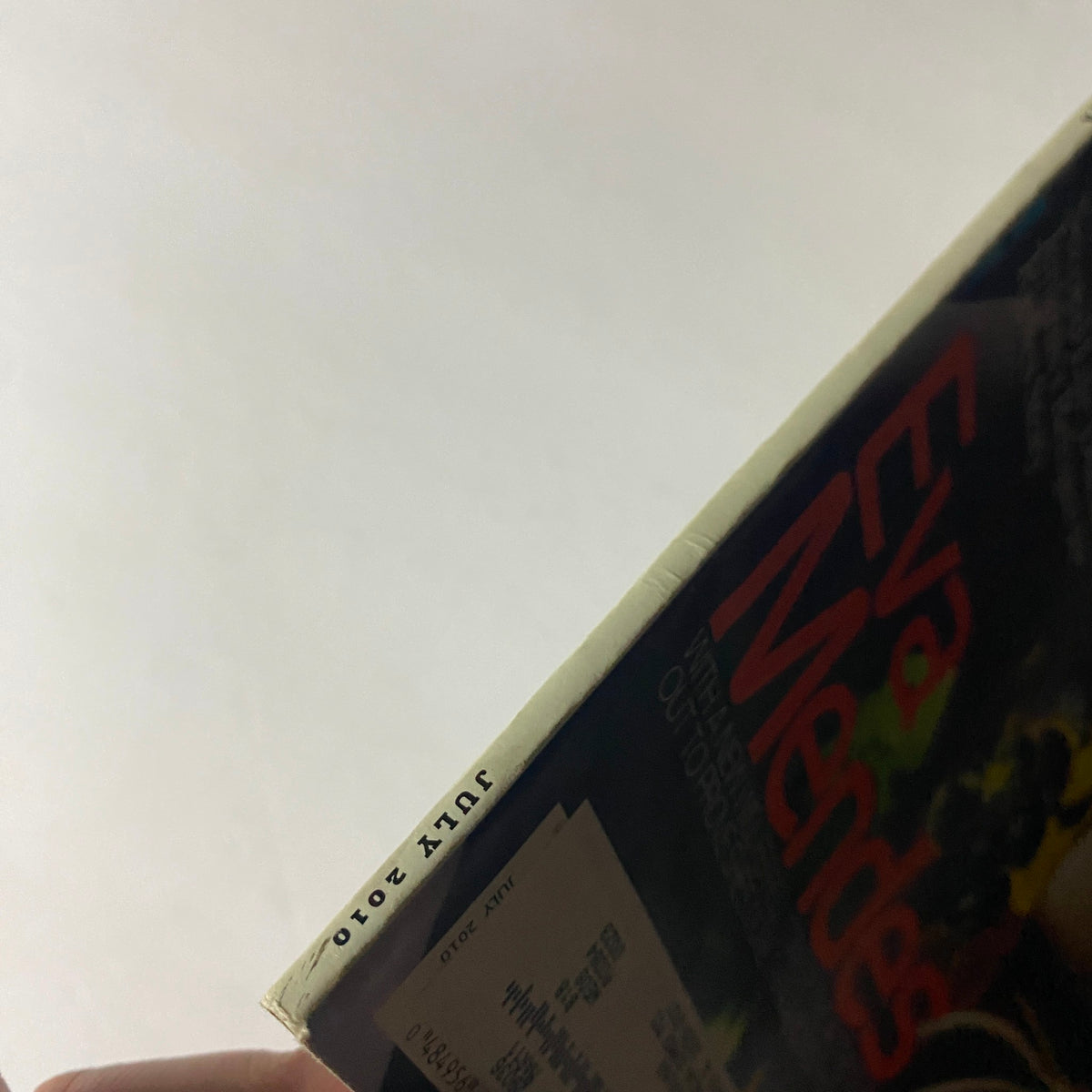 Close-up view of the spine of W Magazine July 2010, highlighting the publication date and featuring Eva Mendes on the cover.