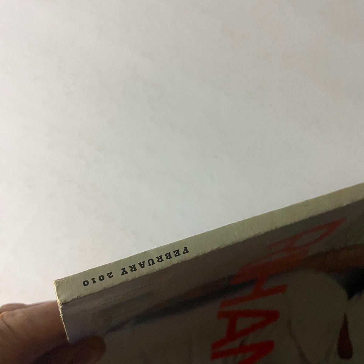 Spine view of W Magazine February 2010 issue featuring Rihanna on the cover, showcasing the publication date and title.
