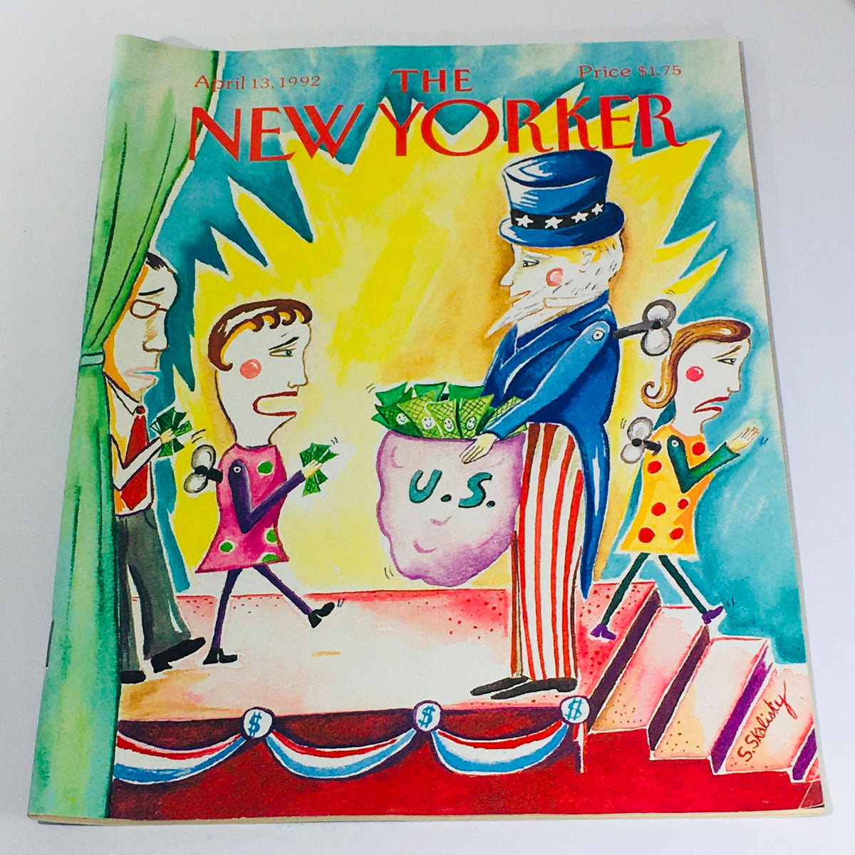 Cover of The New Yorker: April 13 1992 featuring a whimsical illustration by Stephanie Skalisky, depicting characters around a figure resembling Uncle Sam holding a bag labeled 'U.S.' with cash.