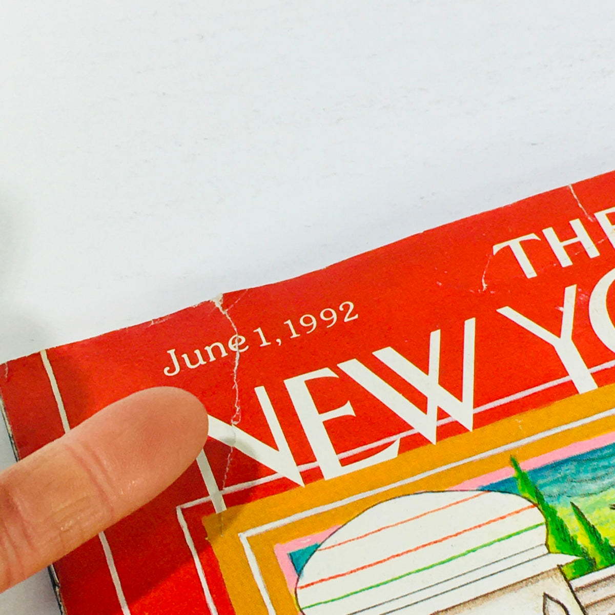 Close-up of The New Yorker June 1 1992 magazine cover edge with date and title, showcasing the vintage aesthetic and wear typical of the era.