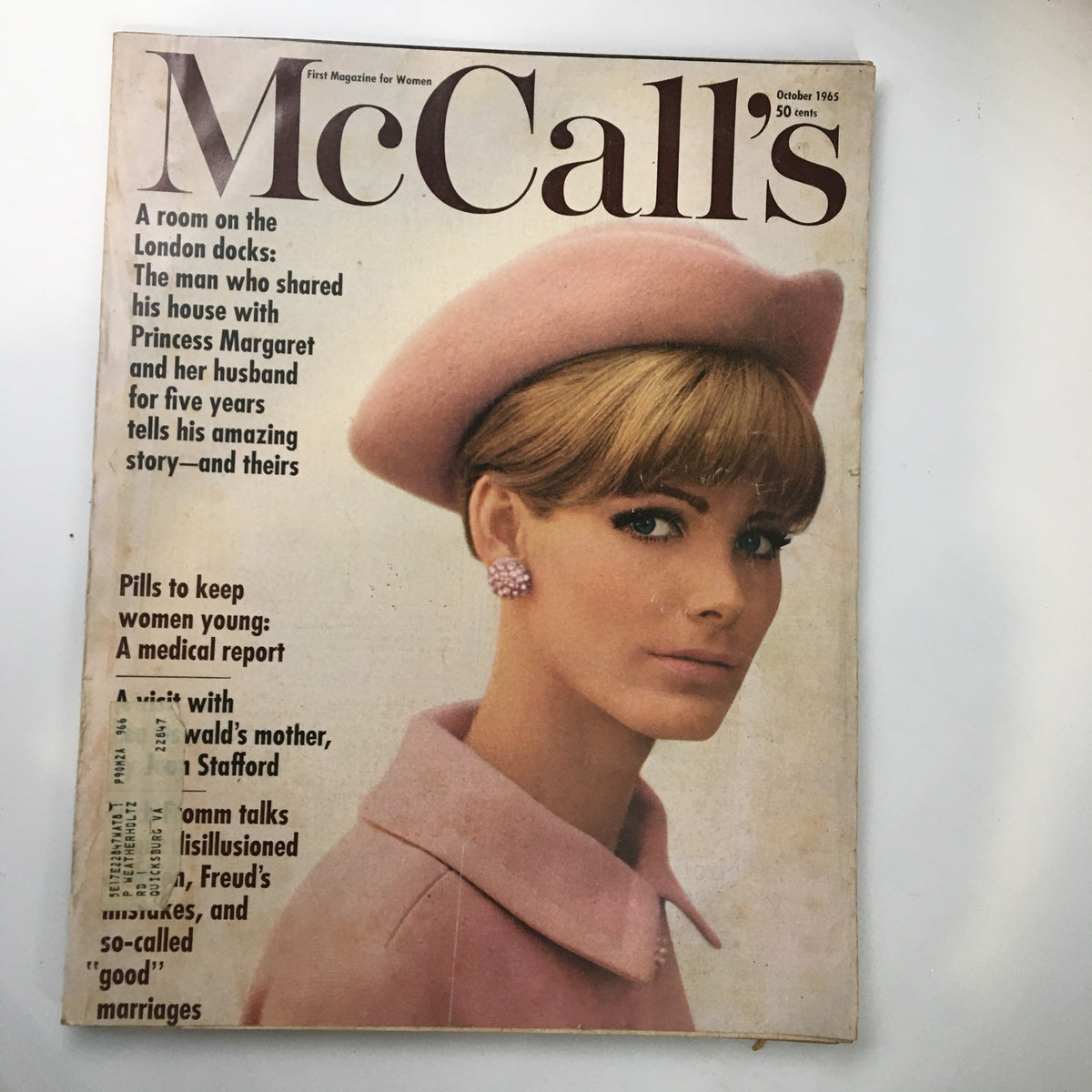 Cover of VTG McCall's Magazine October 1965 featuring a model in a pink hat, highlighting Princess Margaret and her husband's story within.