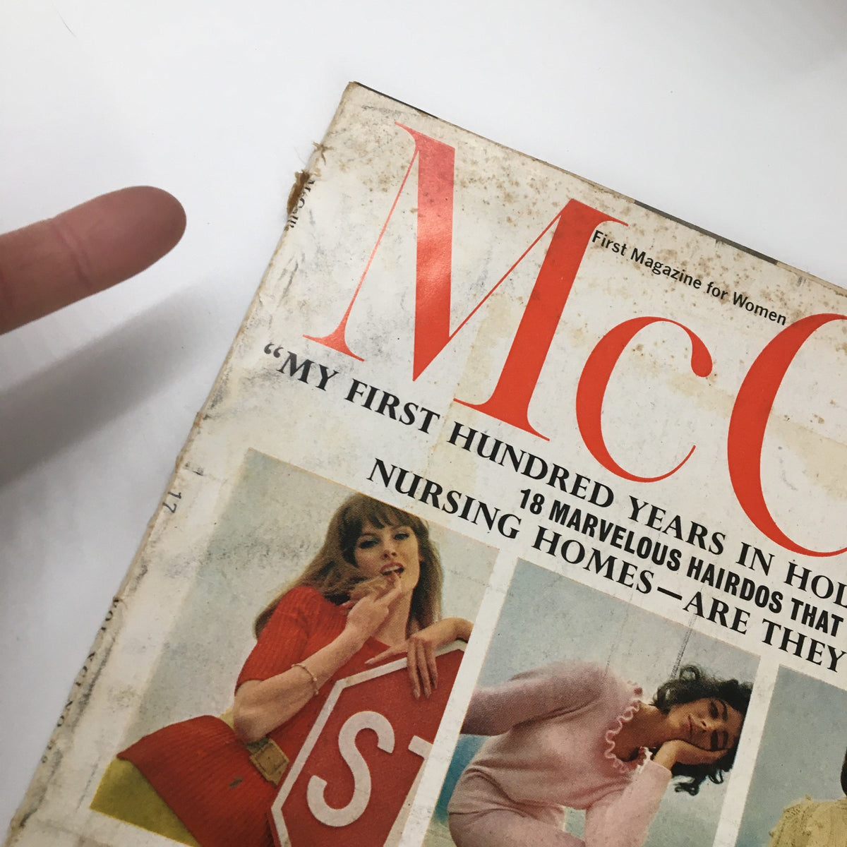 Close-up view of the Vintage McCall's Magazine September 1964 cover, emphasizing the title and featured article about Jack Warner.