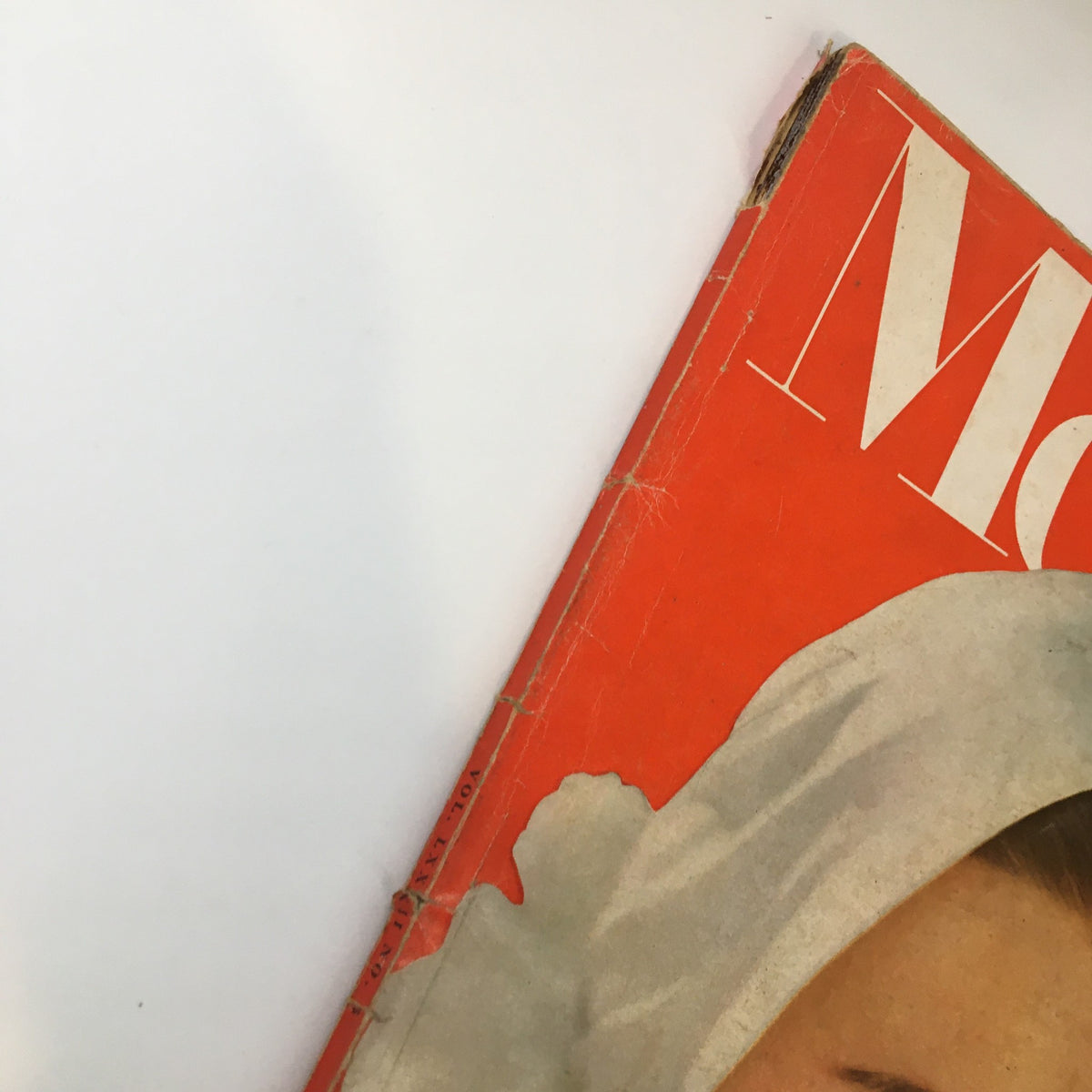 Close-up of the cover of VTG McCall's Magazine February 1955 featuring a whimsical design and the title "The Bachelor Prince Who Needs Wife".