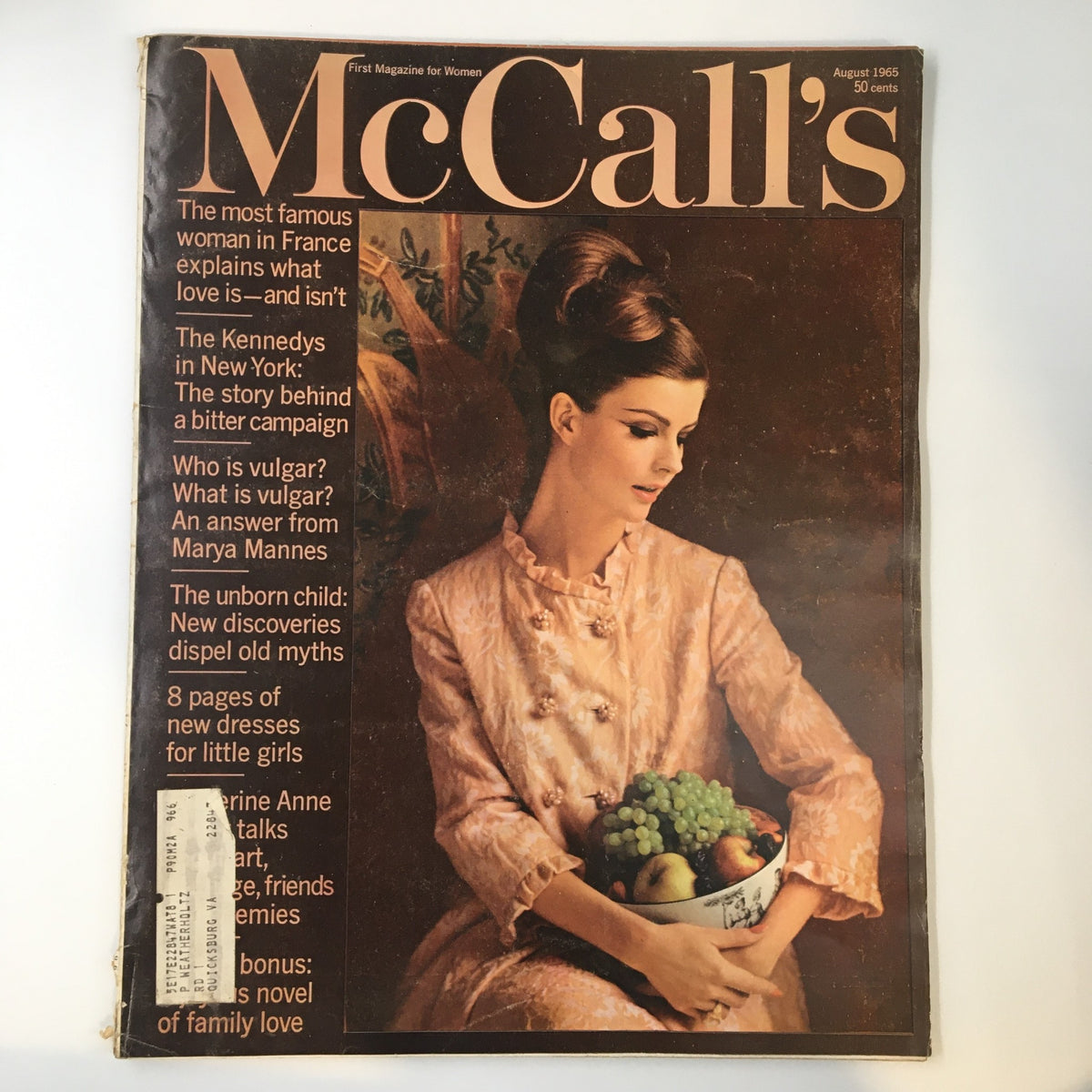 Cover of VTG McCall's Magazine August 1965 featuring a photograph of Angela Howard by Otto Storch, showcasing 1960s fashion and cultural elements.