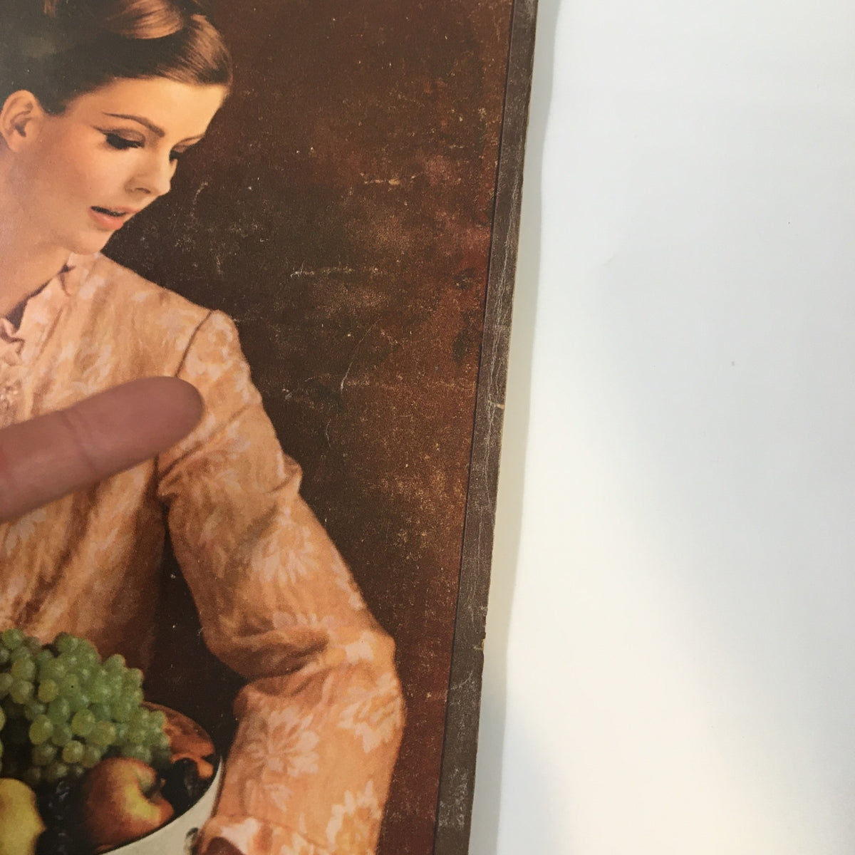 Detail of VTG McCall's Magazine August 1965 cover, highlighting a photograph of Angela Howard by Otto Storch with an emphasis on her hairstyle and attire.