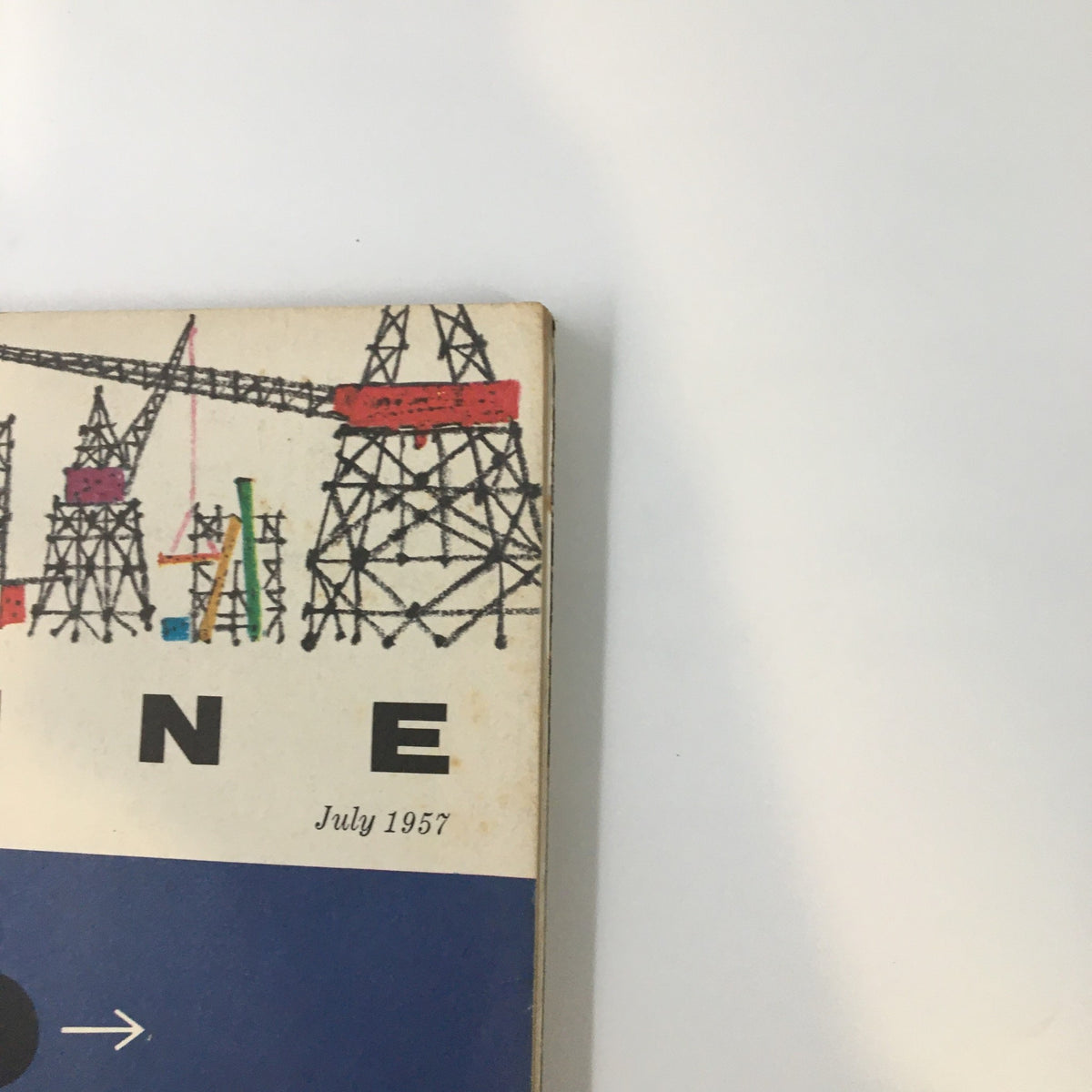 Close-up of the VTG Fortune Magazine July 1957 cover showcasing the magazine title and a detail of the colorful background design.
