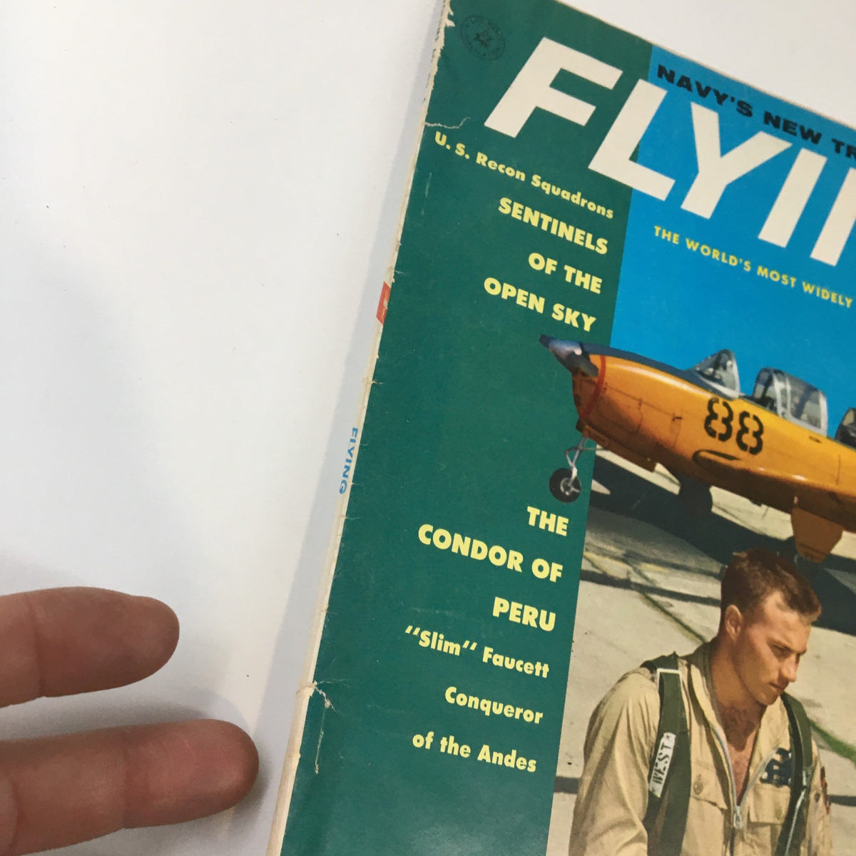 Close-up view of the cover of the VTG Flying Aviation Magazine May 1957 issue, highlighting the title 'Sentinels of the Open Sky' and details about U.S. Recon Squadrons.