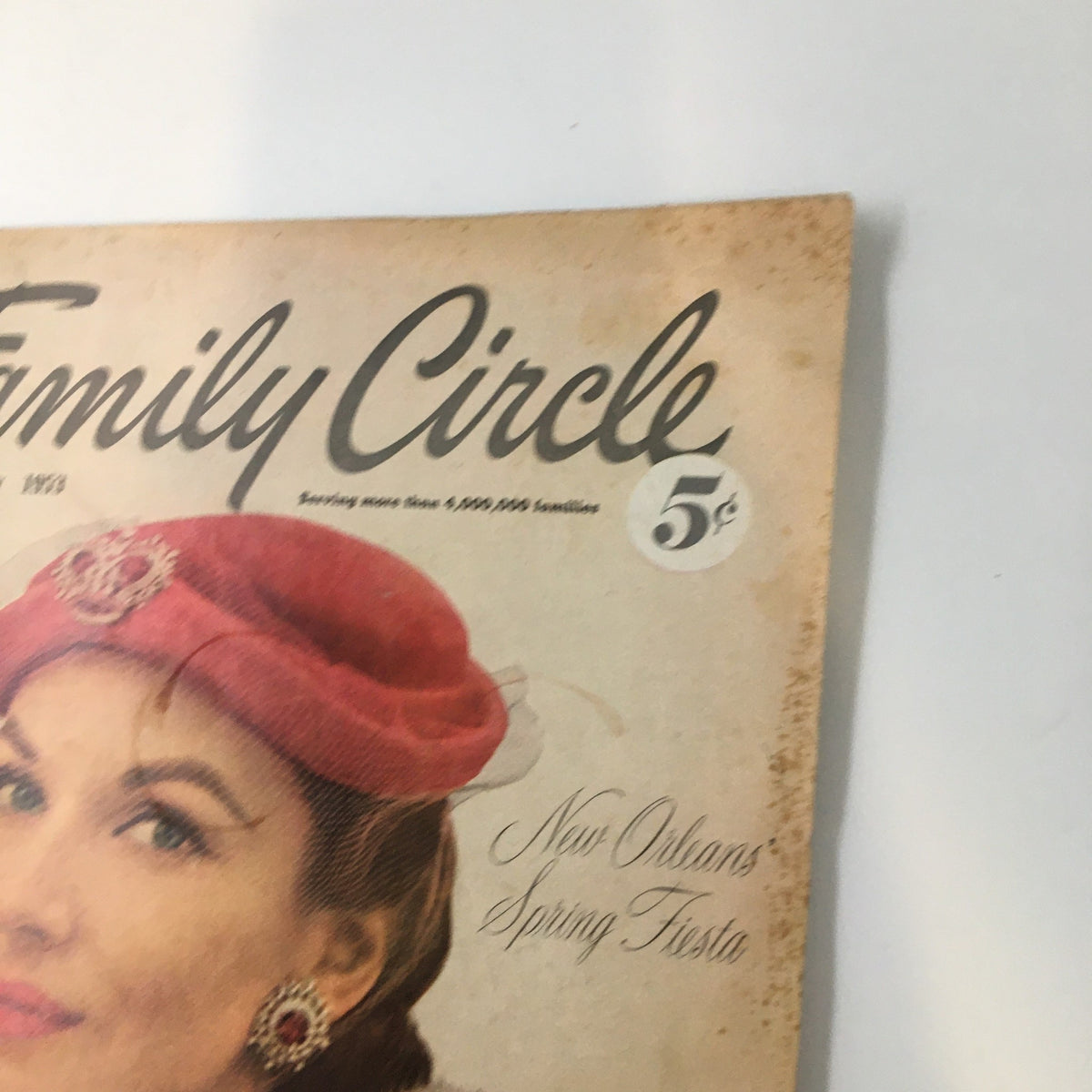Close-up view of the Family Circle Magazine cover from January 1953, highlighting a woman's elegant hat and the magazine's title with a price of 5 cents.