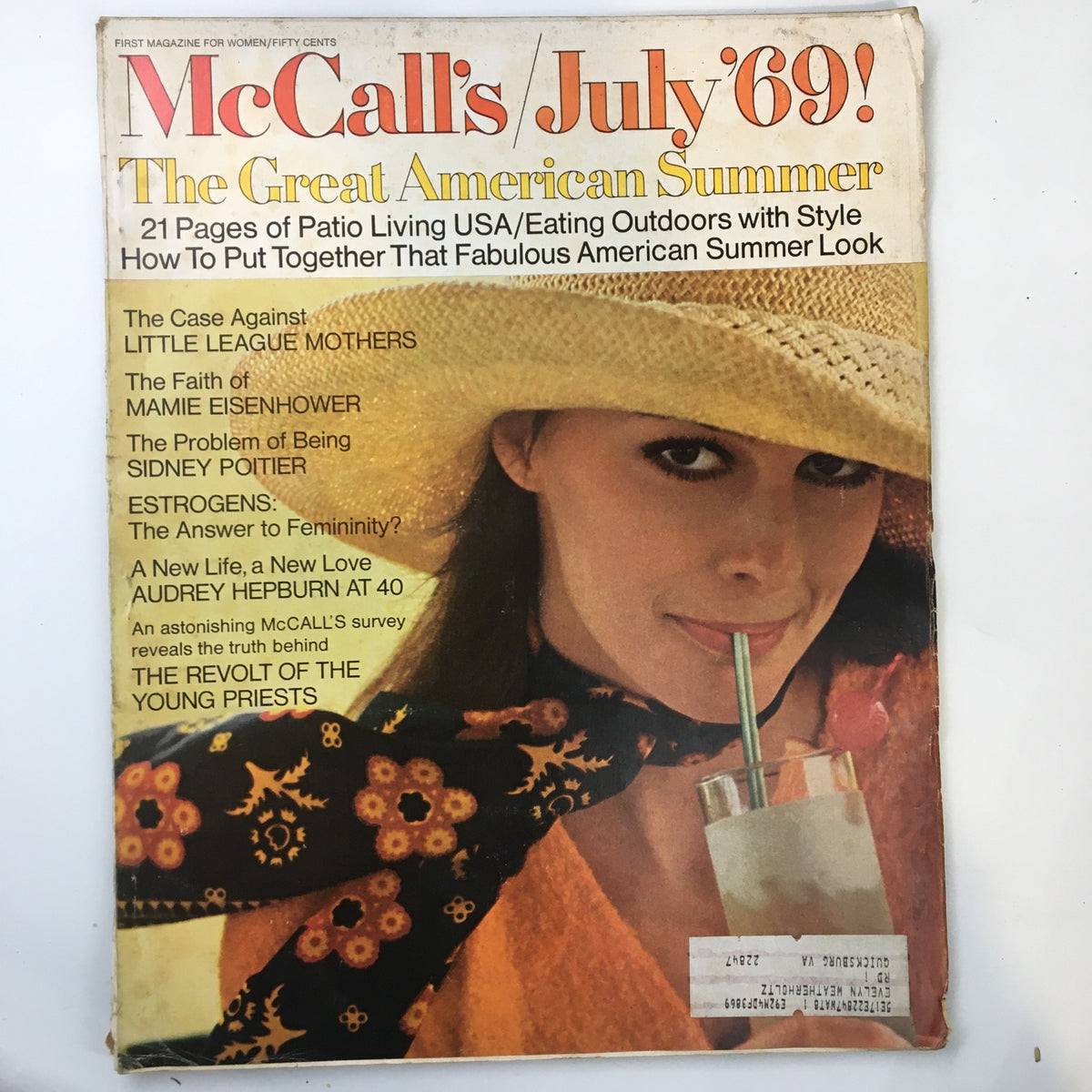 Cover of VTG McCall's Magazine July 1969 featuring the title 'The Case Against Little League Mothers.' The magazine showcases a summer theme with a model in a straw hat sipping a drink, highlighting articles on parenting, fashion, and culture.