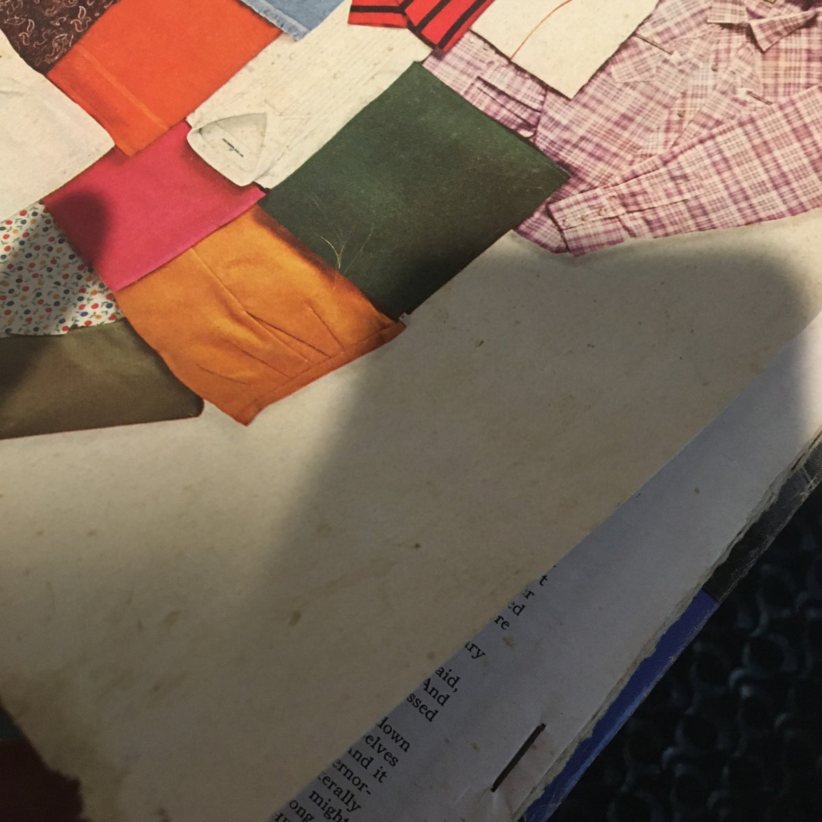 Detail of pages from VTG McCall's Magazine April 1968 showing colorful fabric swatches, reflecting the fashion trends of the 1960s as captured in the vintage issue.