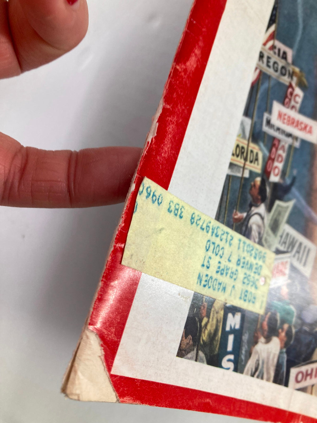Close-up of the spine of the Vintage Newsweek magazine from July 18, 1960, showing details including a price label and vintage wear.