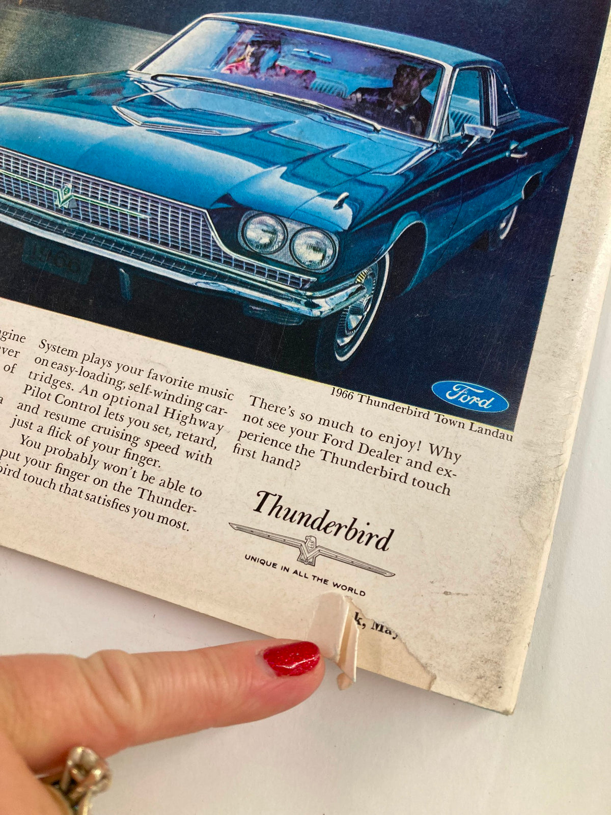 Close-up view of a vintage 1966 Ford Thunderbird advertisement showcasing the car's design and features, as seen in the VTG Newsweek Magazine May 16 1966 Alabama Votes Win for the Wallaces.