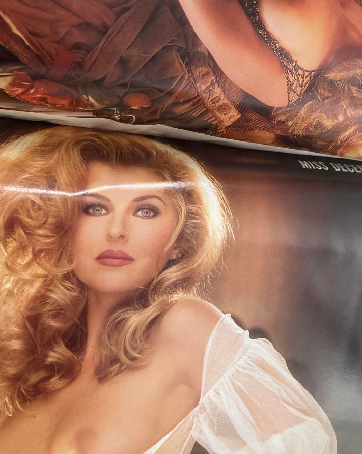 Centerfold image from Playboy Magazine December 1993 showcasing a glamorous model with styled hair and elegant makeup, embodying the vintage aesthetic of the magazine.