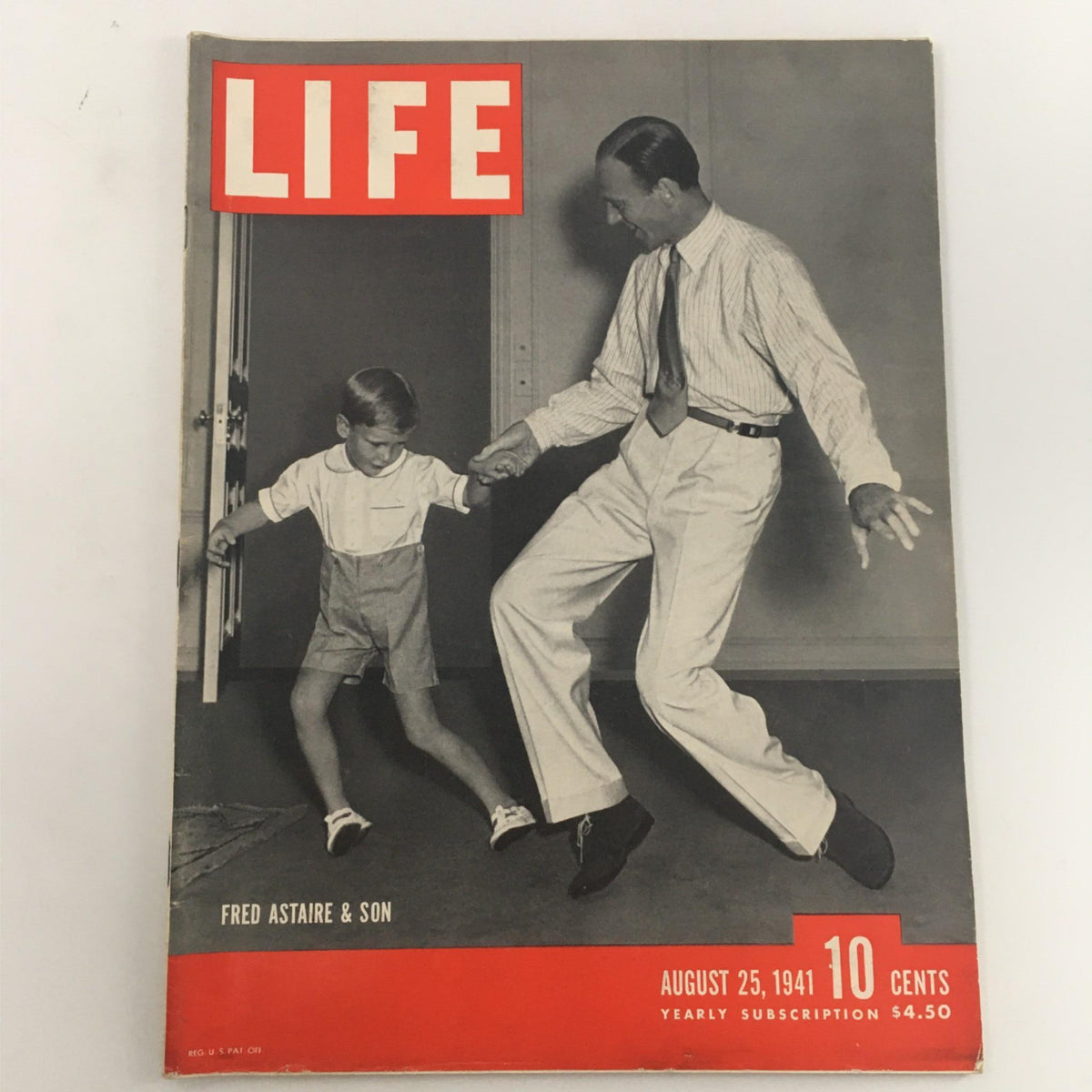 Vintage Life Magazine cover from August 25, 1941 featuring Fred Astaire dancing with his son, showcasing classic Hollywood charm.