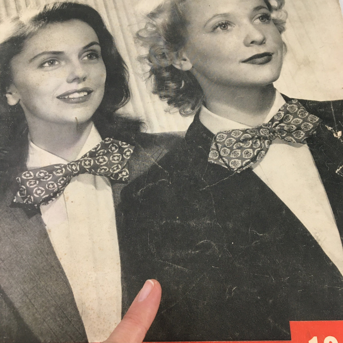 Detail of the VTG Life Magazine March 1 1943 cover showing two women in bow ties, emphasizing classic styles from the 1940s.