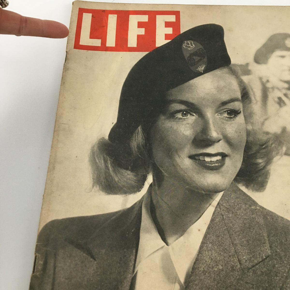 Close-up of the cover of VTG Life Magazine April 5, 1943 highlighting a woman in a Montgomery beret, emphasizing the iconic LIFE magazine logo.