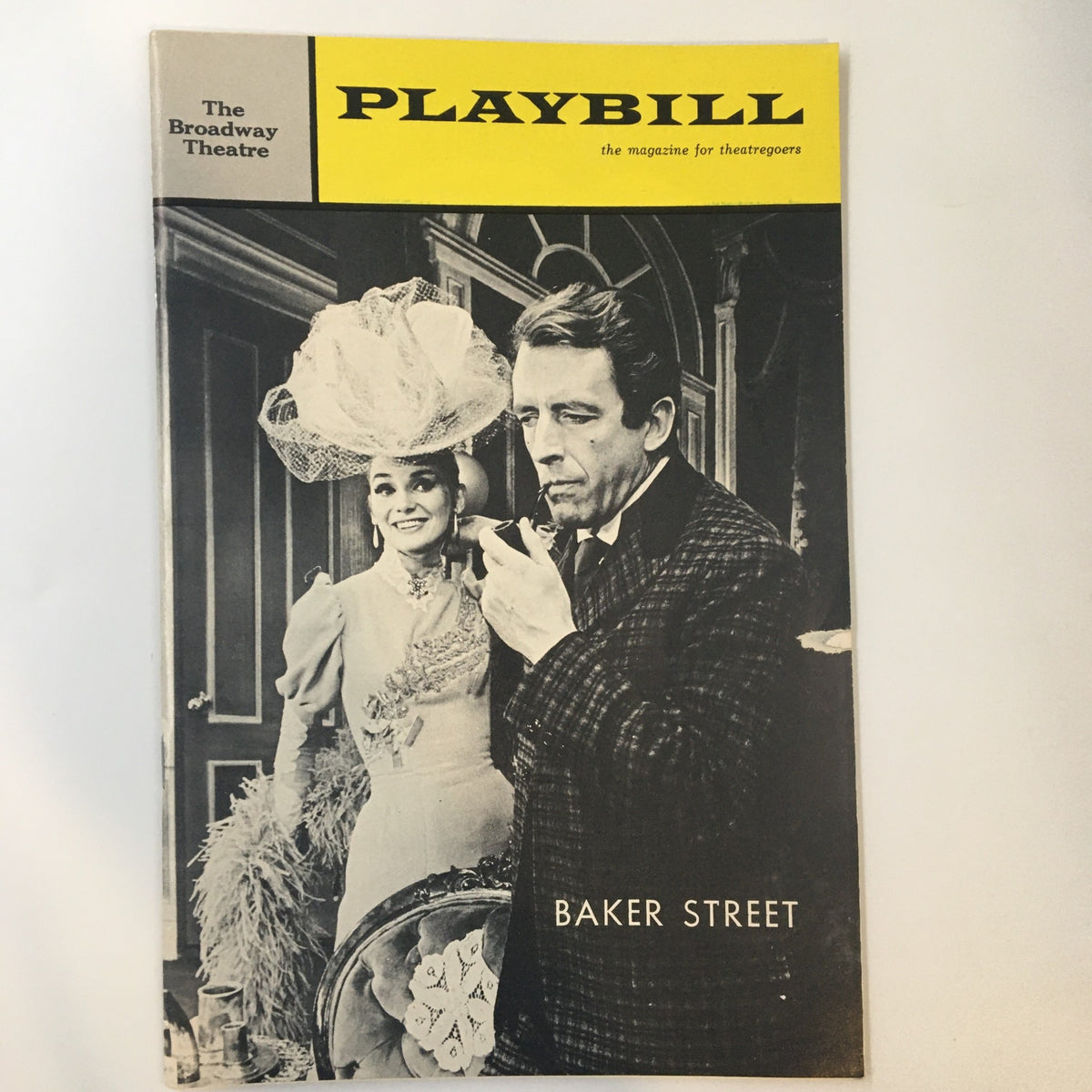 1965 Playbill for Baker Street featuring a black and white photo of two characters, highlighting the Broadway Theatre's vintage design and charm.