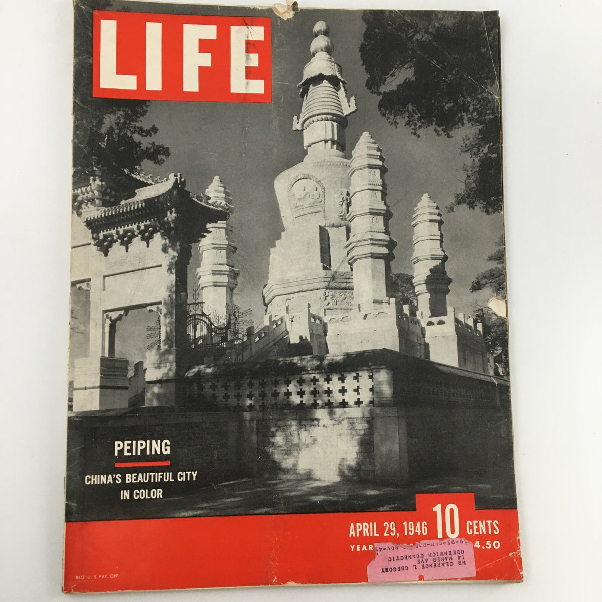 Cover of Life Magazine from April 29, 1946, featuring Peiping, China's Beautiful City in Color, showcasing a historic view with vibrant architecture.