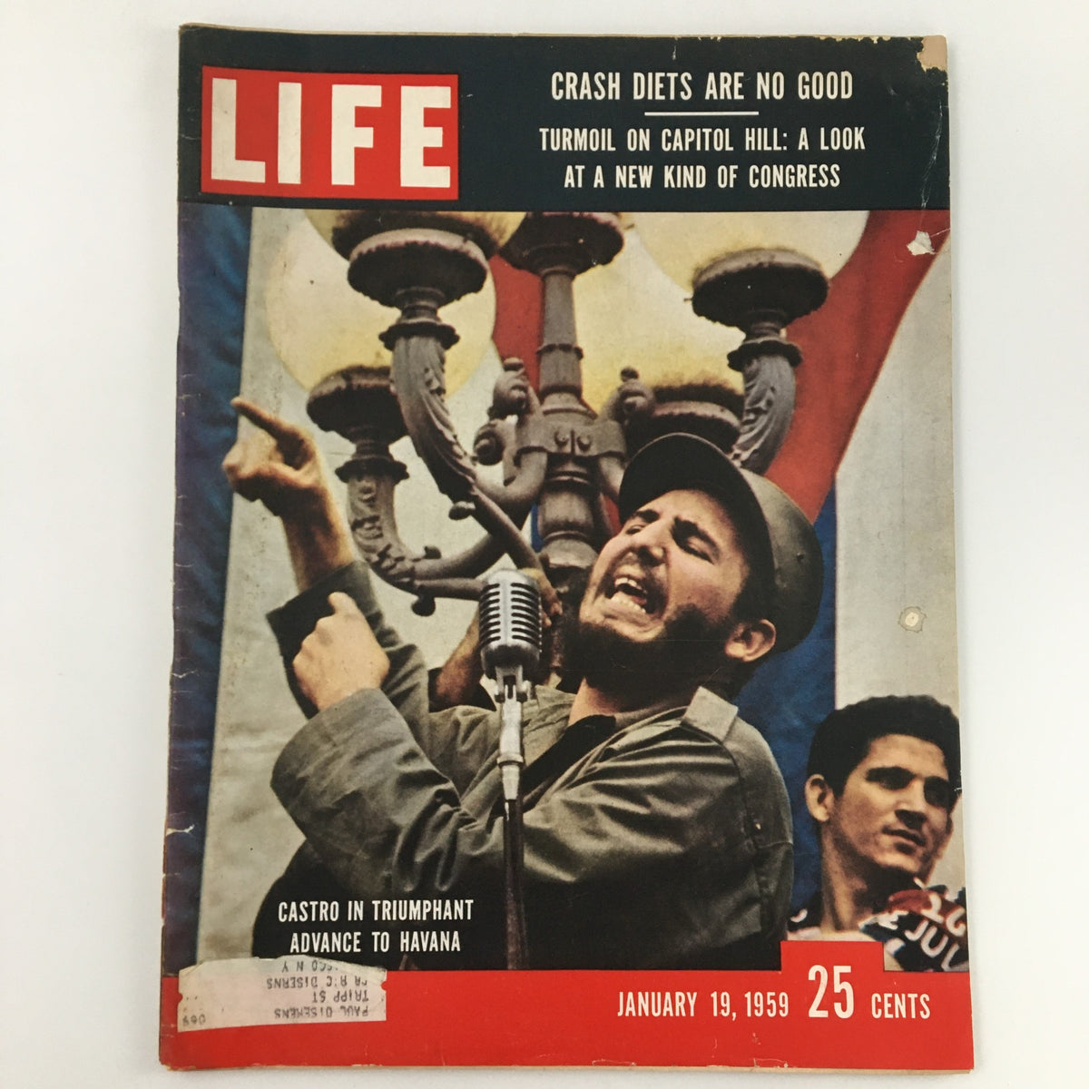 Vintage Life Magazine cover from January 19, 1959, featuring Fidel Castro in a triumphant advance to Havana, showcasing striking imagery and significant historical context.
