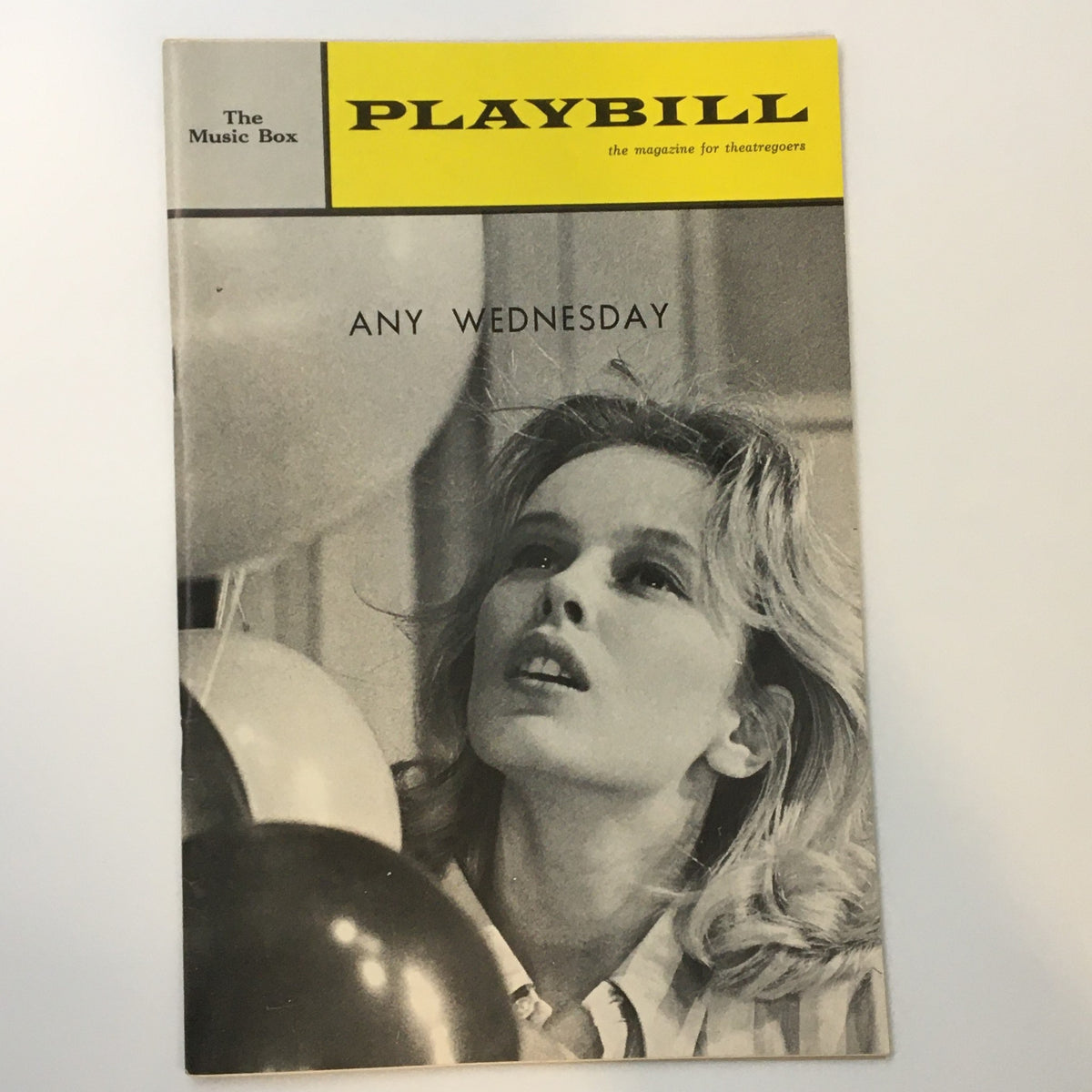 1964 Playbill for The Music Box featuring Any Wednesday with Sandy Dennis, showcasing the cover design in black and white with balloons.