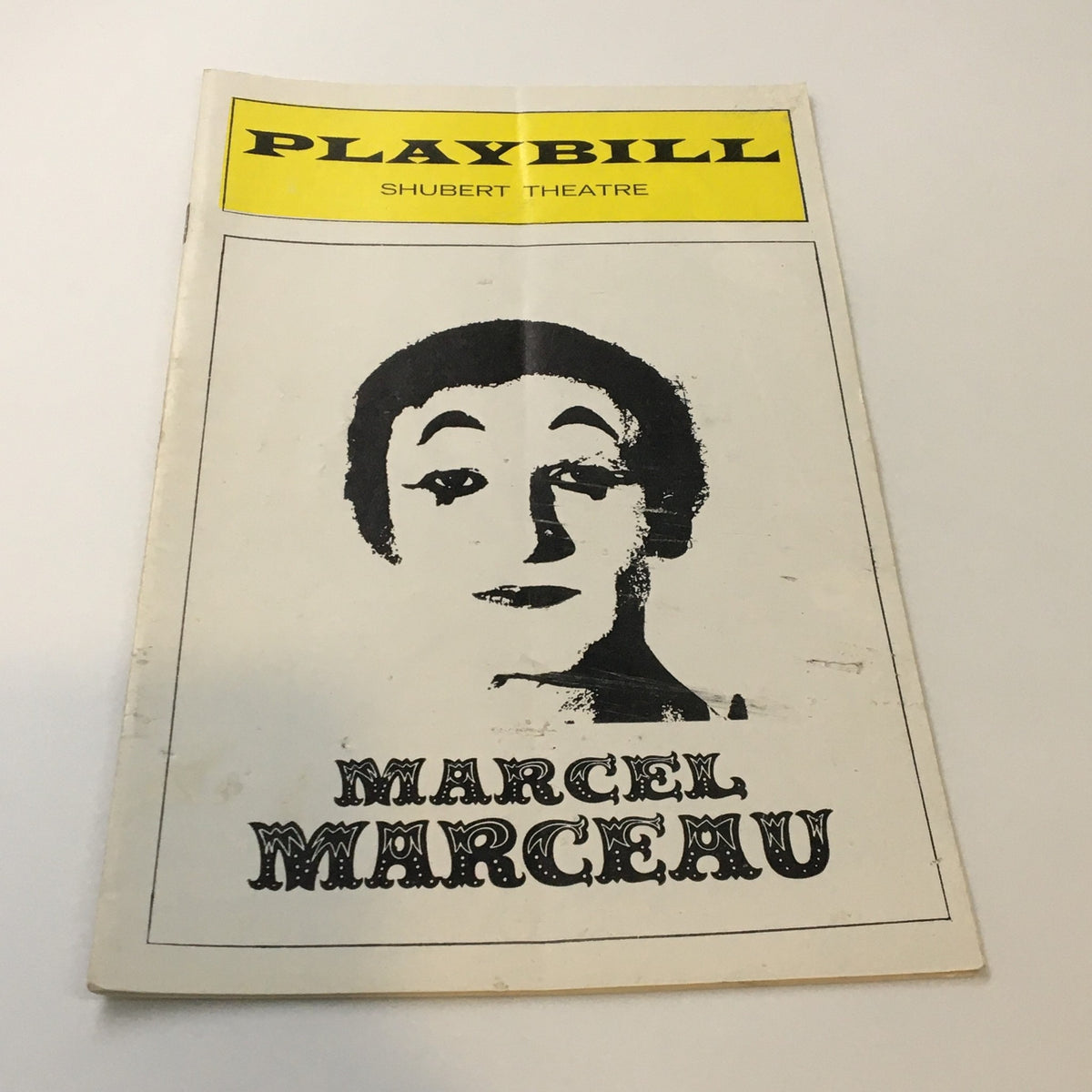 1975 Playbill Shubert Theatre featuring Marcel Marceau, the Renowned French Mime, showcasing a black-and-white illustration of the iconic performer.