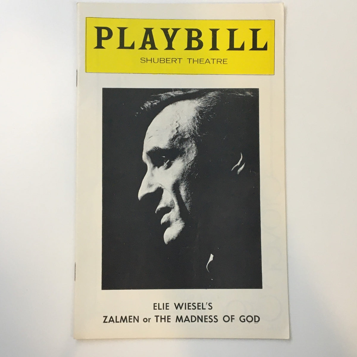 Cover of the 1976 Playbill for Elie Wiesel's Zalmen or The Madness of God at Shubert Theatre, featuring a profile image of a male actor.