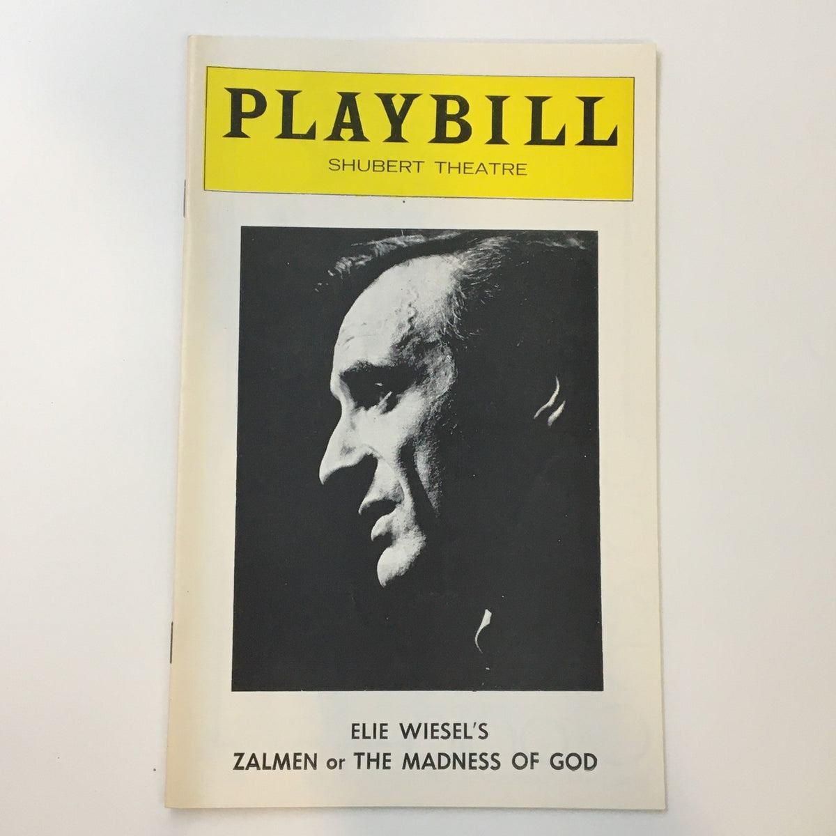 1976 Playbill from the Shubert Theatre featuring Zalmen or The Madness of God by Joseph Wiseman, showcasing a profile image of Elie Wiesel.
