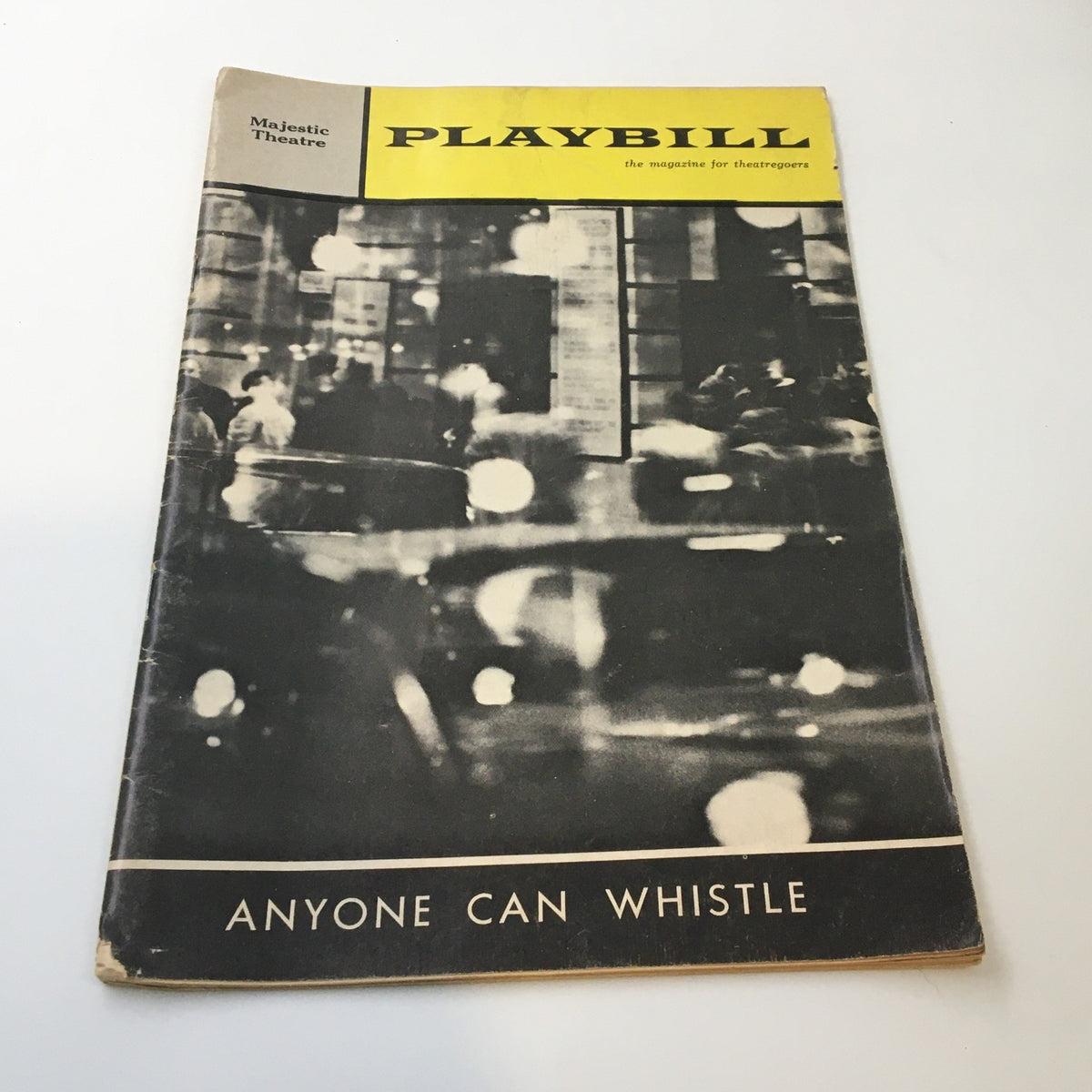 1964 Playbill for 'Anyone Can Whistle' featuring Lee Remick at the Majestic Theatre, showcasing a vintage design with a black and white city scene.