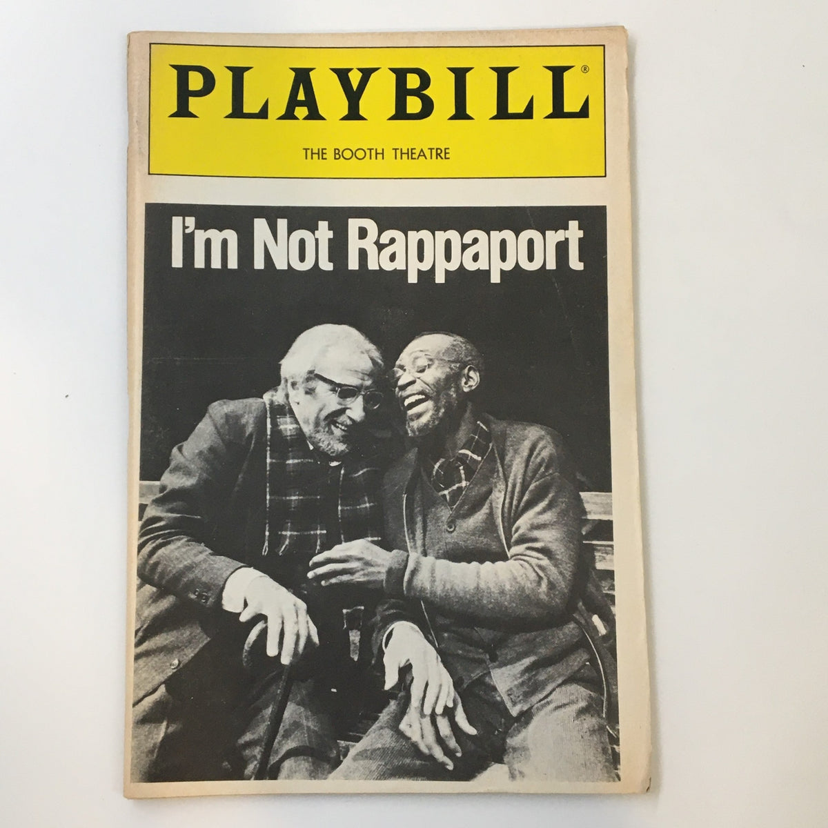 1986 Playbill for I'm Not Rappaport at the Booth Theatre featuring Judd Hirsch and Cleavon Little, showcasing iconic black and white photography of the performers.