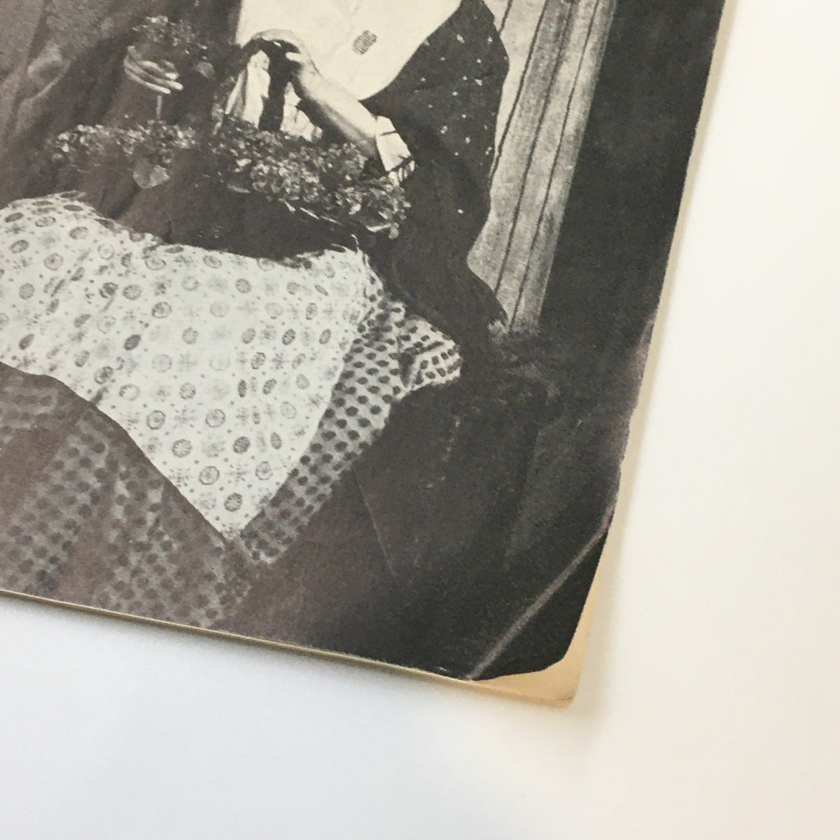 Close-up view of the 1960 Playbill for My Fair Lady, showcasing a detailed image of the performers with their costumes.