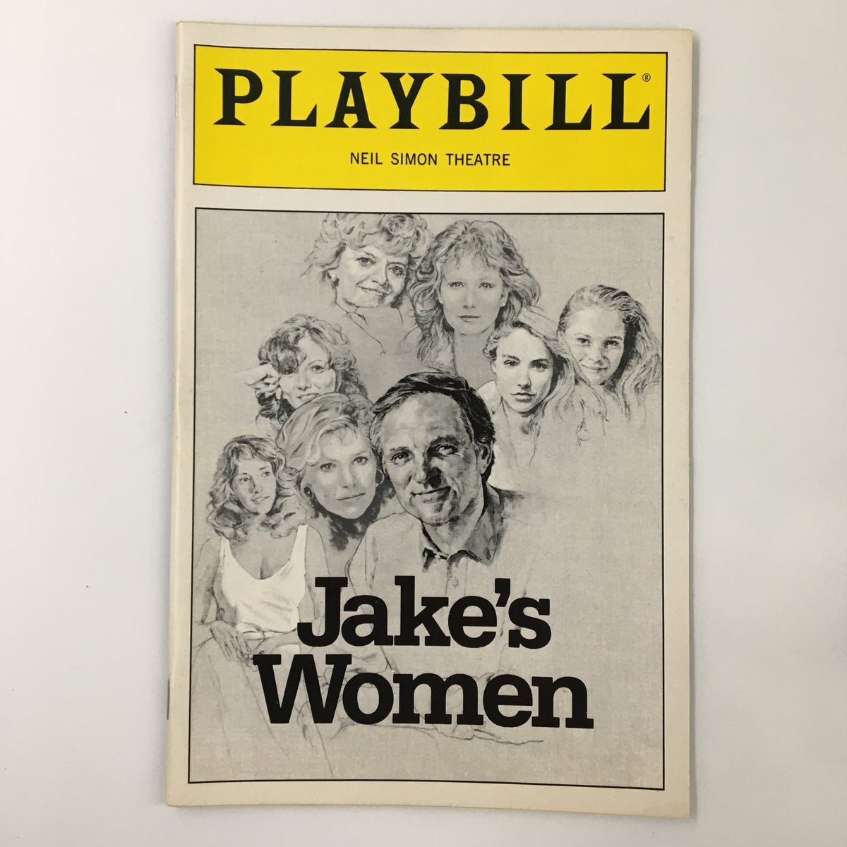 1992 Playbill for Neil Simon's "Jake's Women" featuring Alan Alda, displayed on a classic theater backdrop.