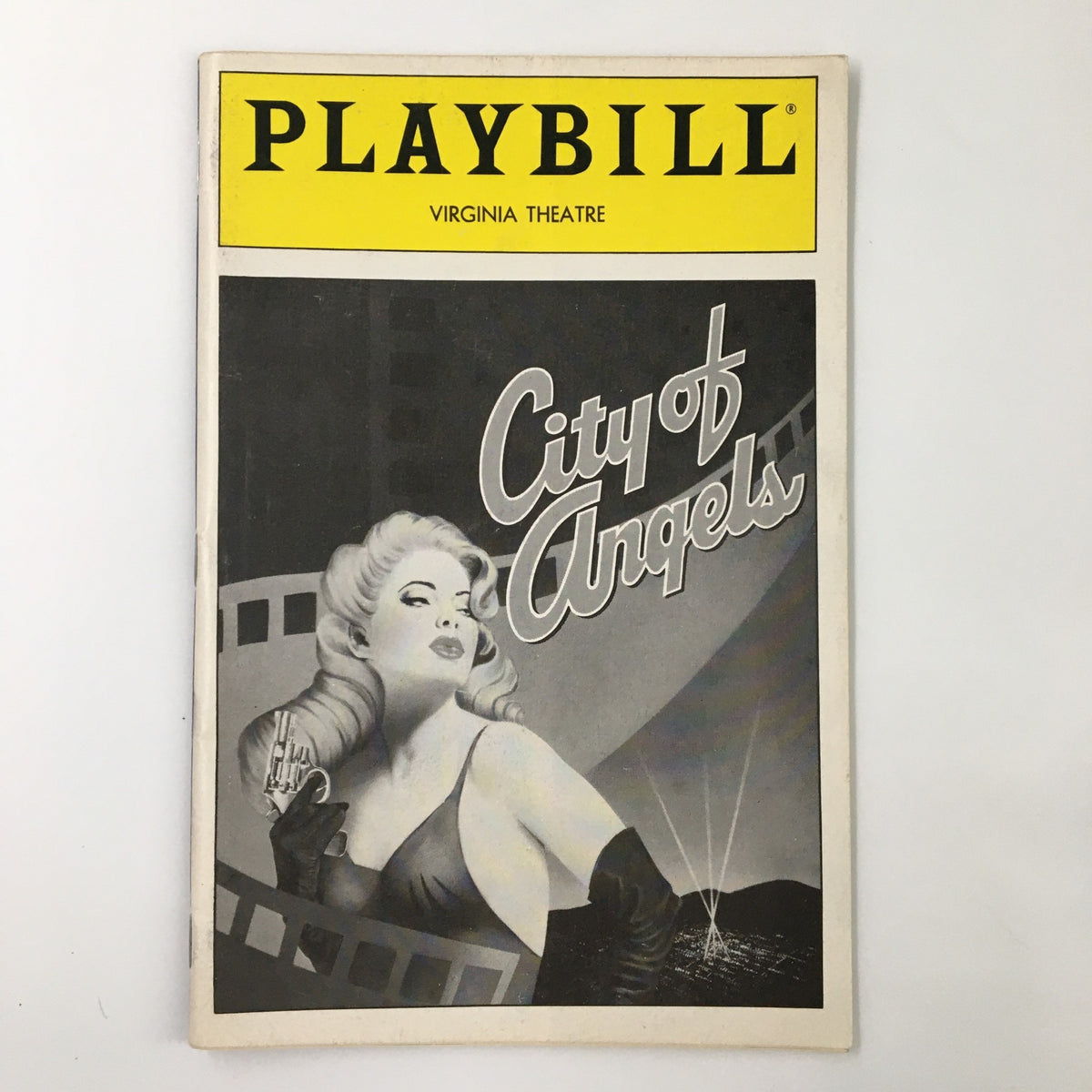 1990 Playbill from Virginia Theatre featuring the musical City of Angels with a classic black and white design and a glamorous actress on the cover.