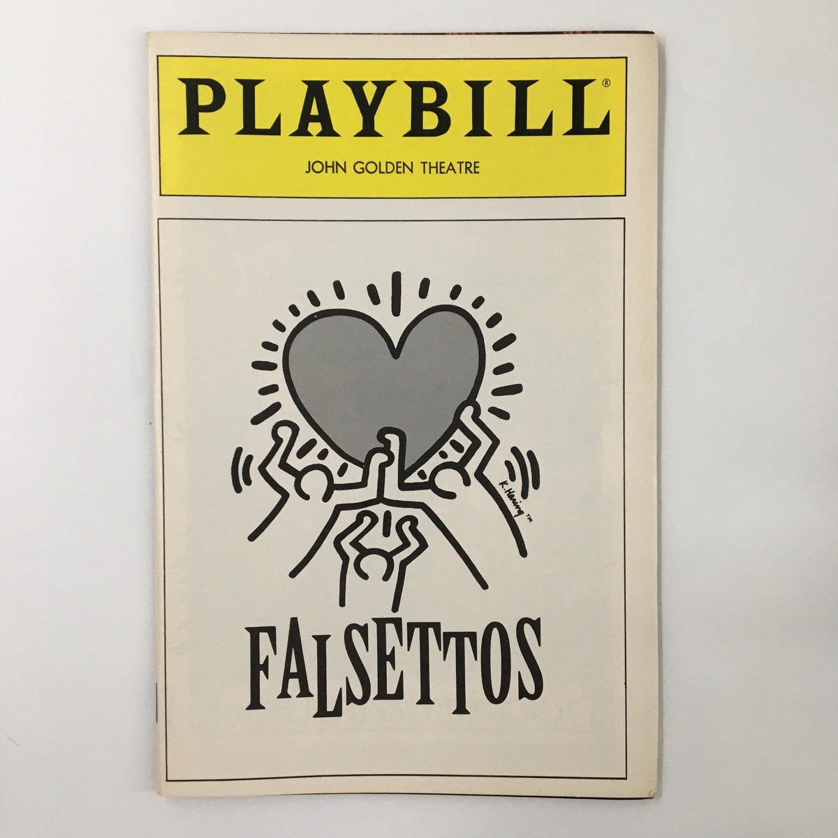 1992 Playbill for Falsettos at John Golden Theatre featuring an artistic cover design with a heart graphic and the title 'Falsettos' by James Lapine and Michael Rupert.
