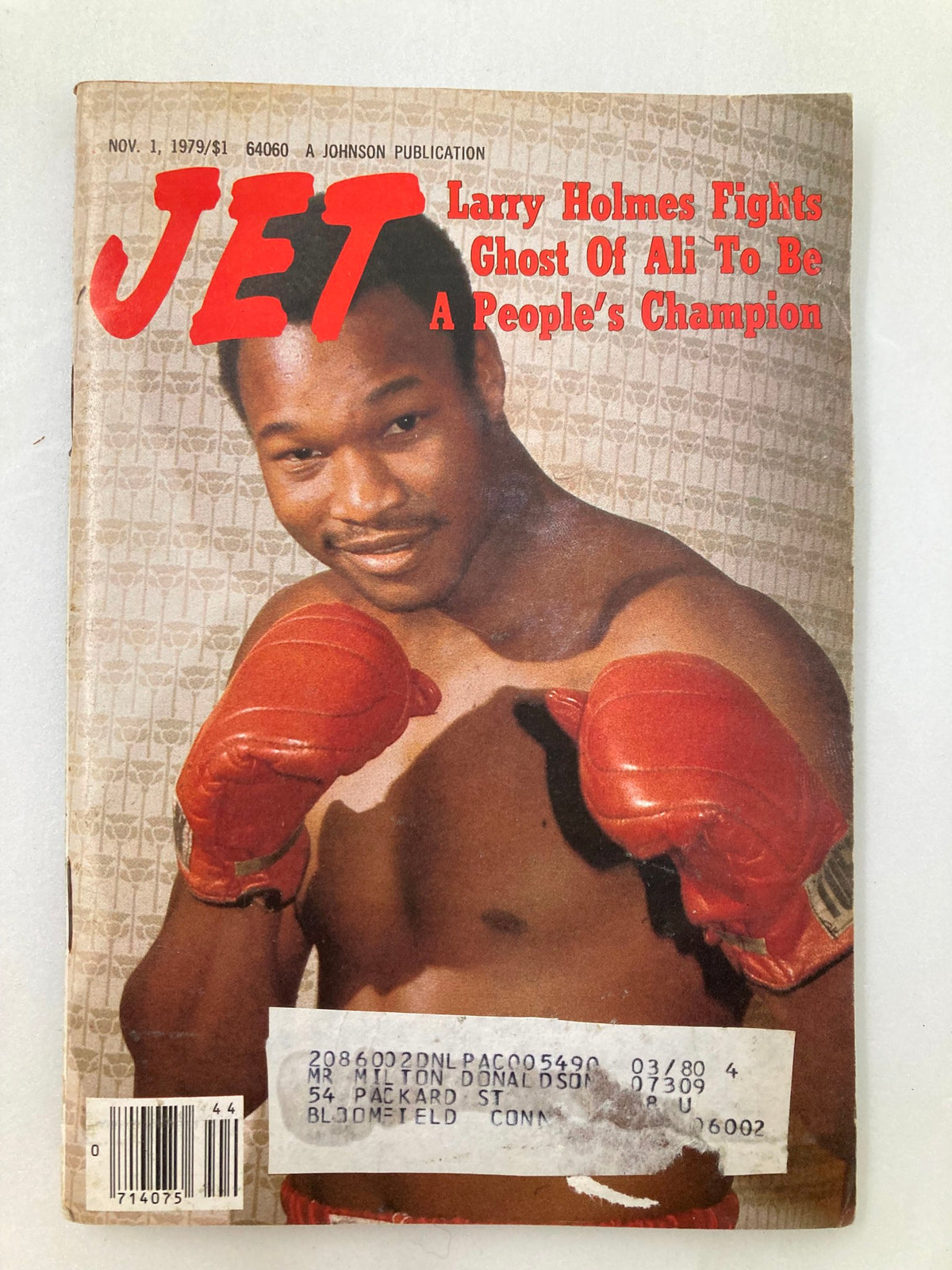 Cover of VTG Jet Magazine November 1 1979 Vol 57 #7 featuring Larry Holmes, a boxing champion, depicted with boxing gloves, showcasing the headline "Larry Holmes Fights Ghost Of Ali To Be A People's Champion." The magazine is in good condition with minor wear and a label on the front.