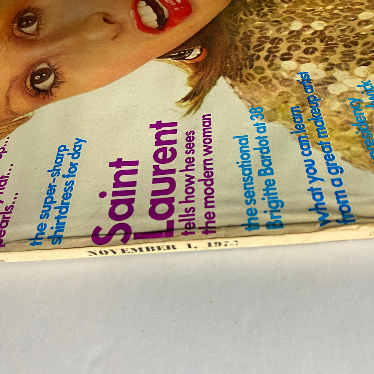 Cover detail of Vogue Magazine November 1972 featuring Saint Laurent's insights on women's fashion and modern styles.
