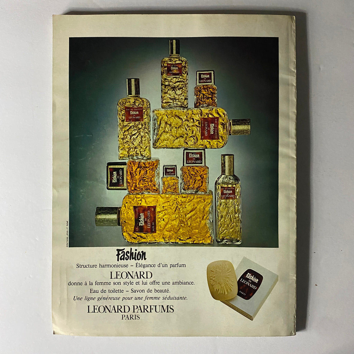 Advertisement page for Leonard Parfums from Vogue Paris Magazine August 1971, featuring elegant perfume bottles and luxurious branding.