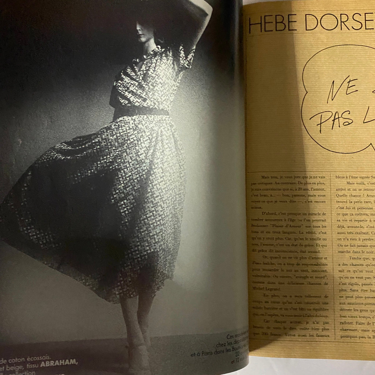 Fashion editorial featuring a model in a stylish dress, accompanied by text from Hebe Dorsey, from Vogue Paris Magazine February 1975.