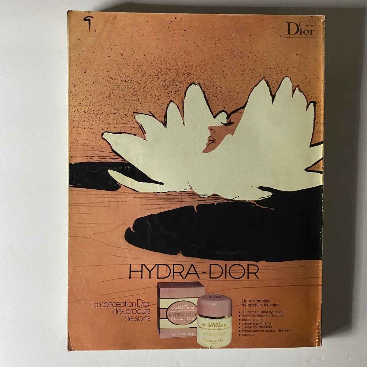 Vogue Paris Magazine September 1974 Anna Andersen Cover featuring an artistic advertisement for Hydra-Dior, showcasing skin care products with a floral design on the cover.