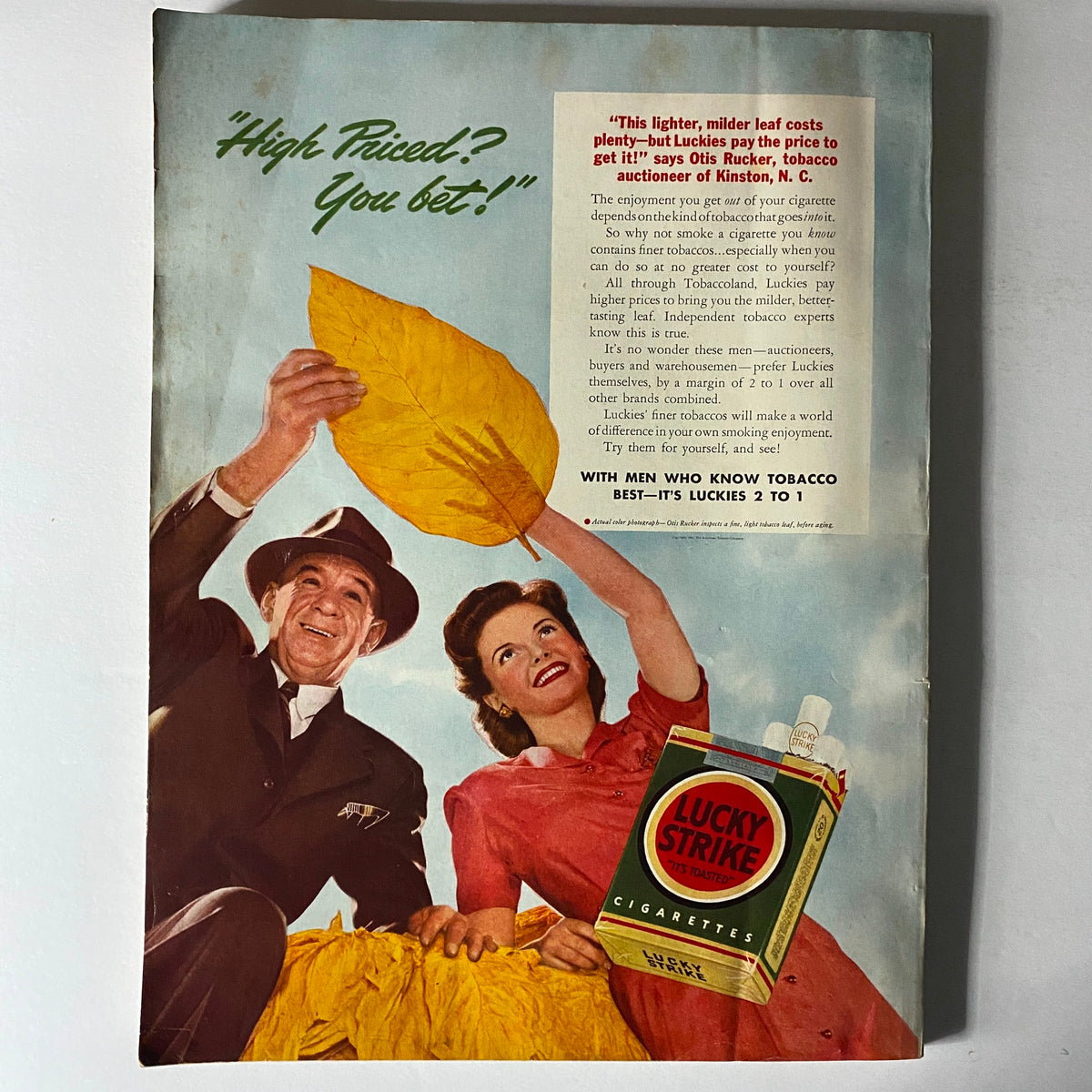 Cover of Harper's Bazaar Magazine August 1941 featuring College Fashions, showcasing a cheerful couple promoting Lucky Strike cigarettes with a bright yellow leaf backdrop, emphasizing vintage fashion and advertising trends from the early 1940s.