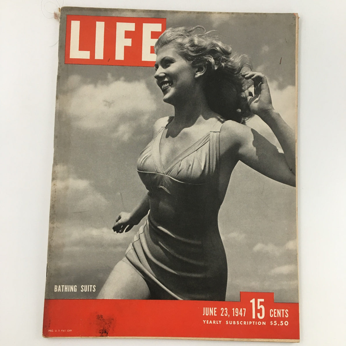 Cover image of VTG Life Magazine June 23 1947 featuring a model in a stylish bathing suit, showcasing classic mid-century fashion and vibrant summer scenes.