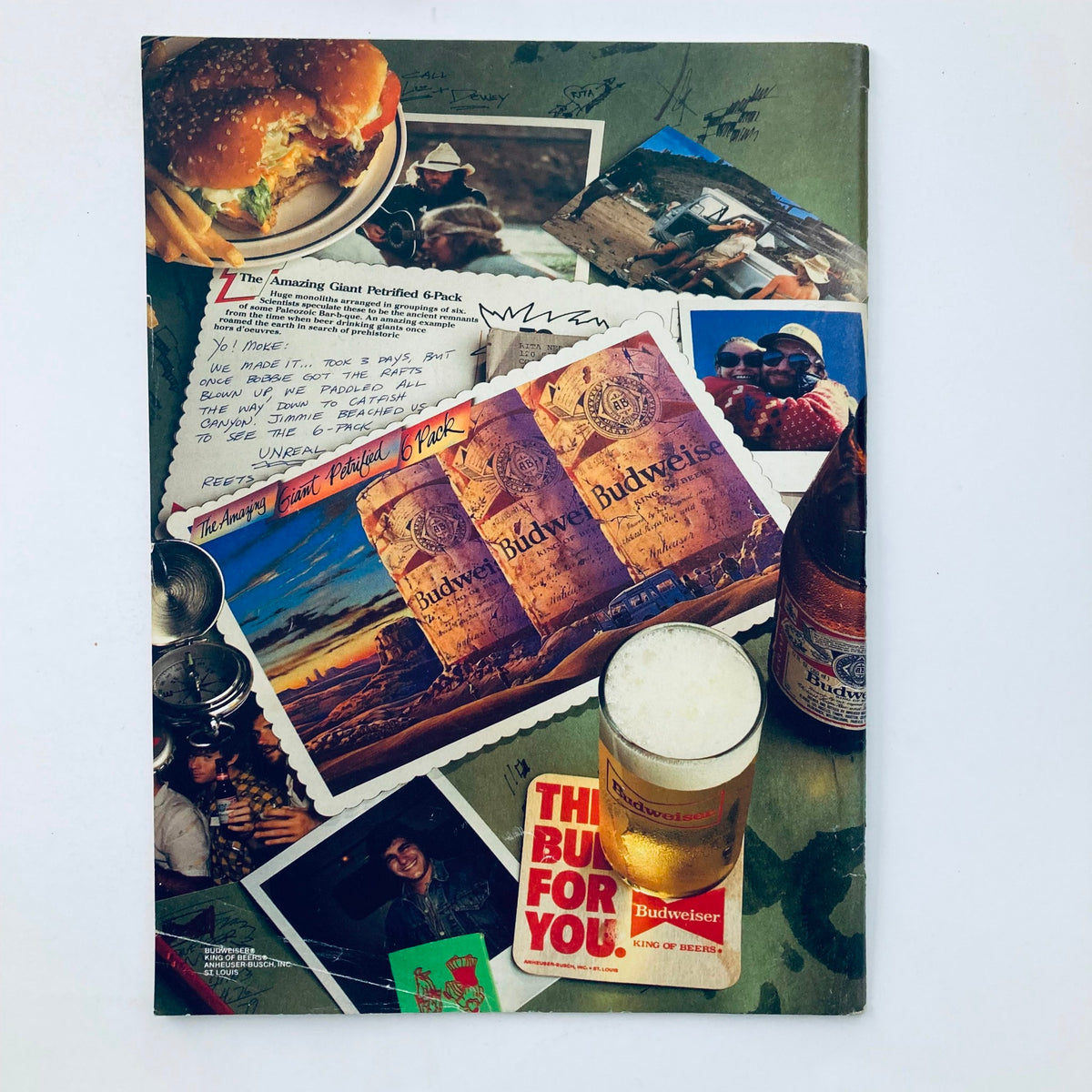 Cover of the Vtg National Lampoon Magazine April 1986 featuring a collage of vintage photos, Budweiser advertisements, and a delicious hamburger, highlighting its rare collectible nature.