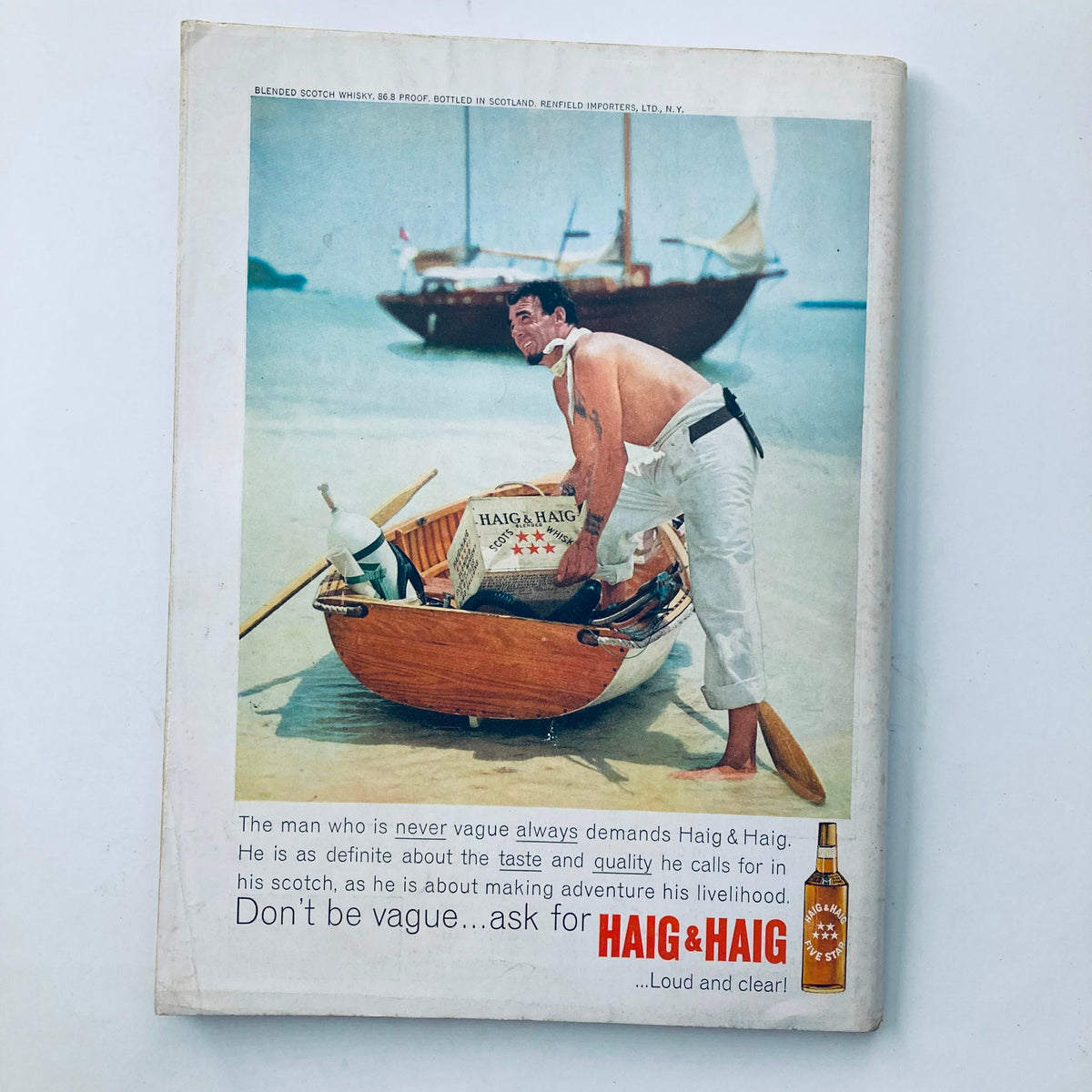 VTG Playboy Magazine September 1963 Covergirl Joey Thorpe with Centerfold No Label, showcasing a vintage advertisement featuring a man on a beach with a boat.