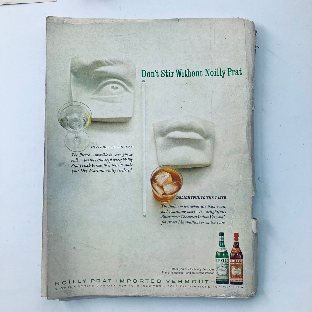 Back cover of VTG Playboy Magazine November 1963 featuring a vintage advertisement for Noilly Prat vermouth, illustrating cocktail glasses and a stylized white sculptural design.