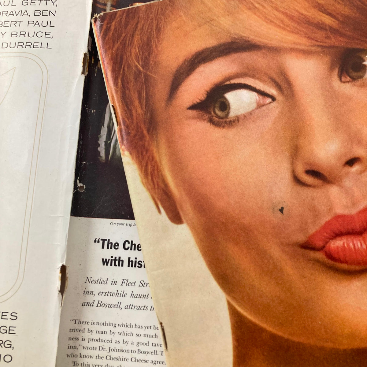 Close-up of VTG Playboy Magazine December 1963 featuring Playmate Donna Michelle with an artistic angle showcasing her makeup and facial features.