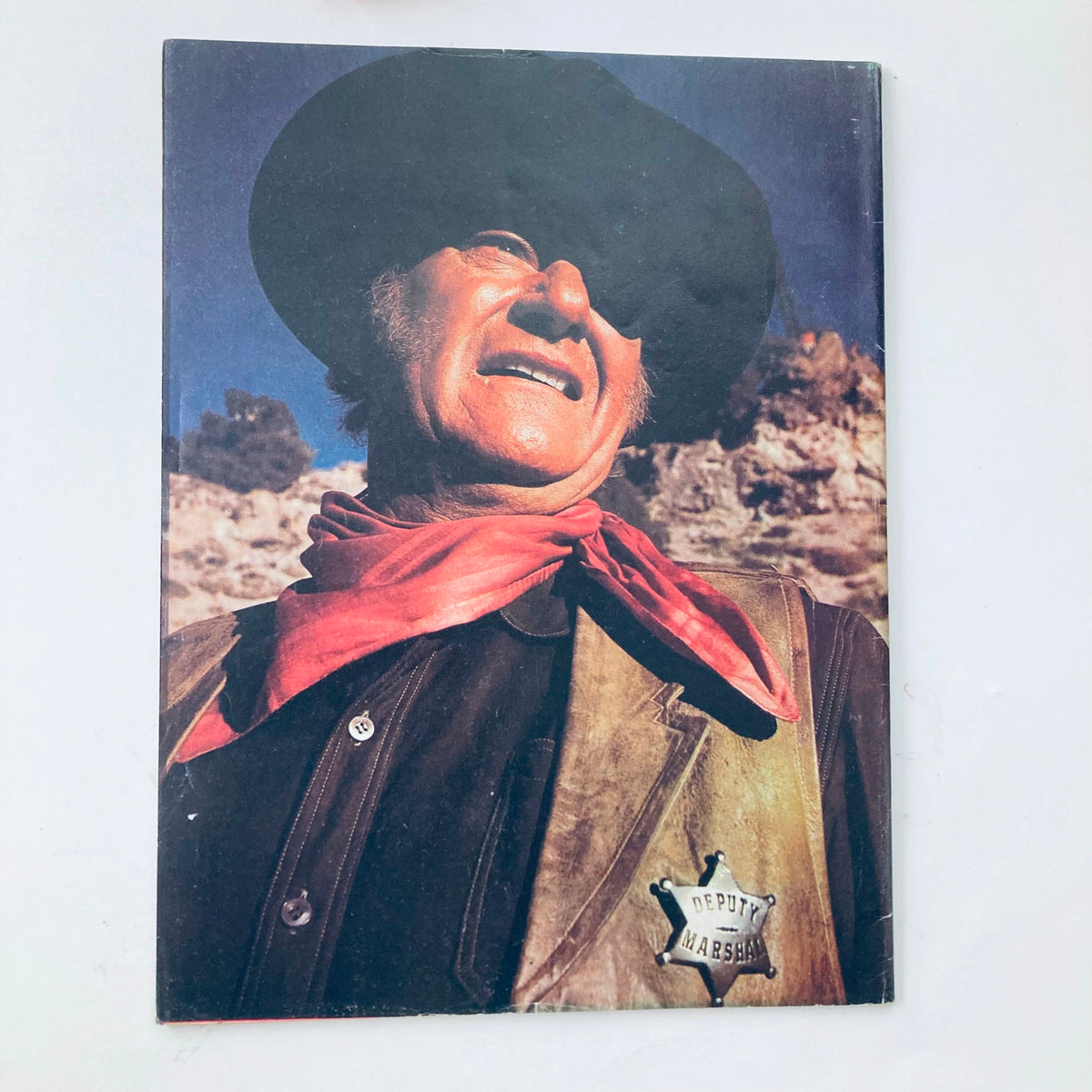 Cover of the vintage 1979 magazine 'John Wayne: An American Legend,' featuring a depiction of John Wayne as a Deputy Marshal.