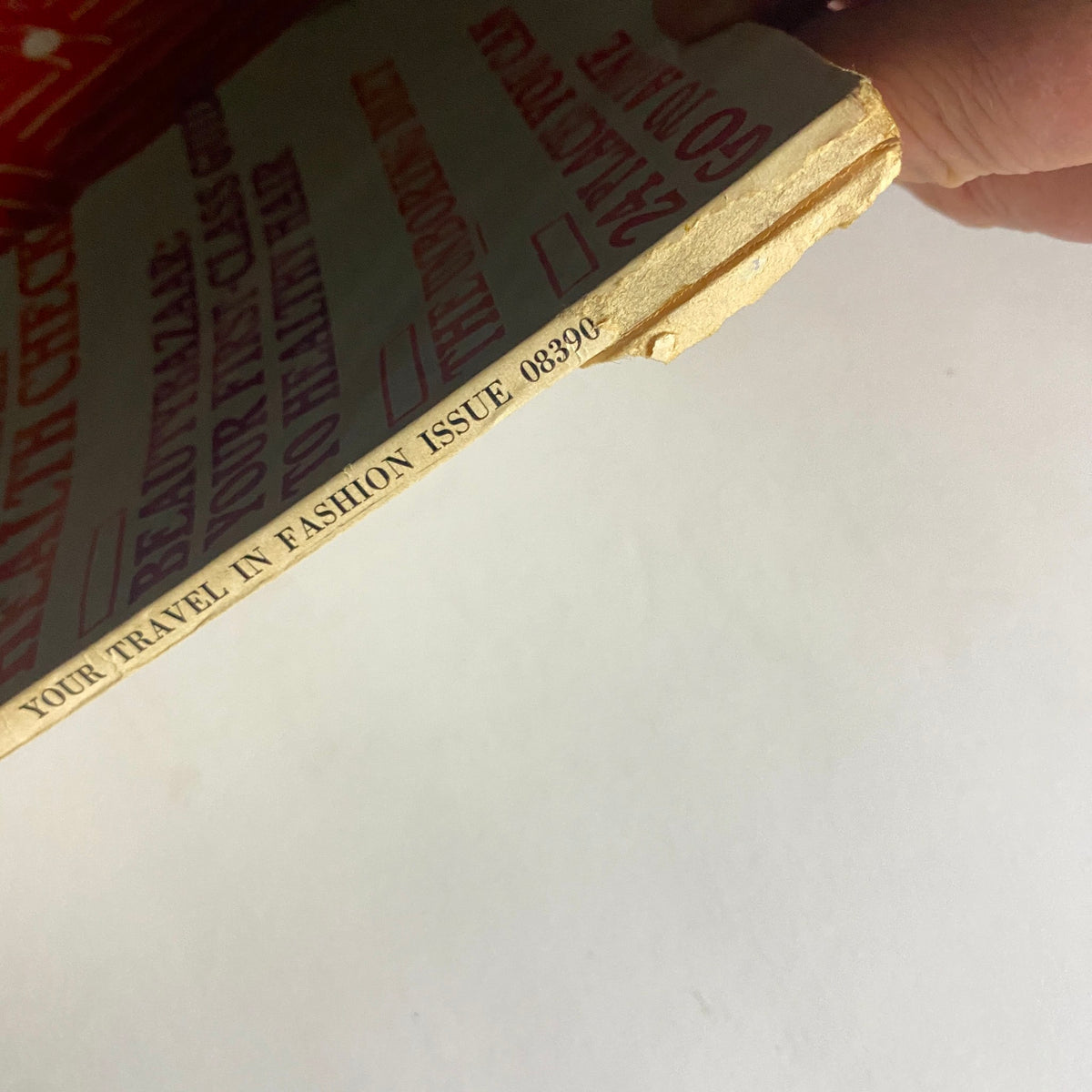 Edge of the Harper's Bazaar Magazine, May 1973 featuring the inscription 'YOUR TRAVEL IN FASHION ISSUE 08390', highlighting the vintage appeal of this collectible magazine.